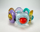 Jackie Brazil "Saturn" Transparent Paris Mix Disc & Ball Elastic Bracelet ( B0052 )