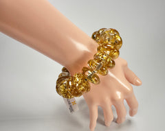 Jackie Brazil "Ana" Gold Flakes Elasticated Wheels Resin Bracelet ( B0910 )