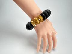 Jackie Brazil "Ana" Black Matt & Gold Flakes Mix Elasticated Wheels Resin Bracelet ( B0910 )