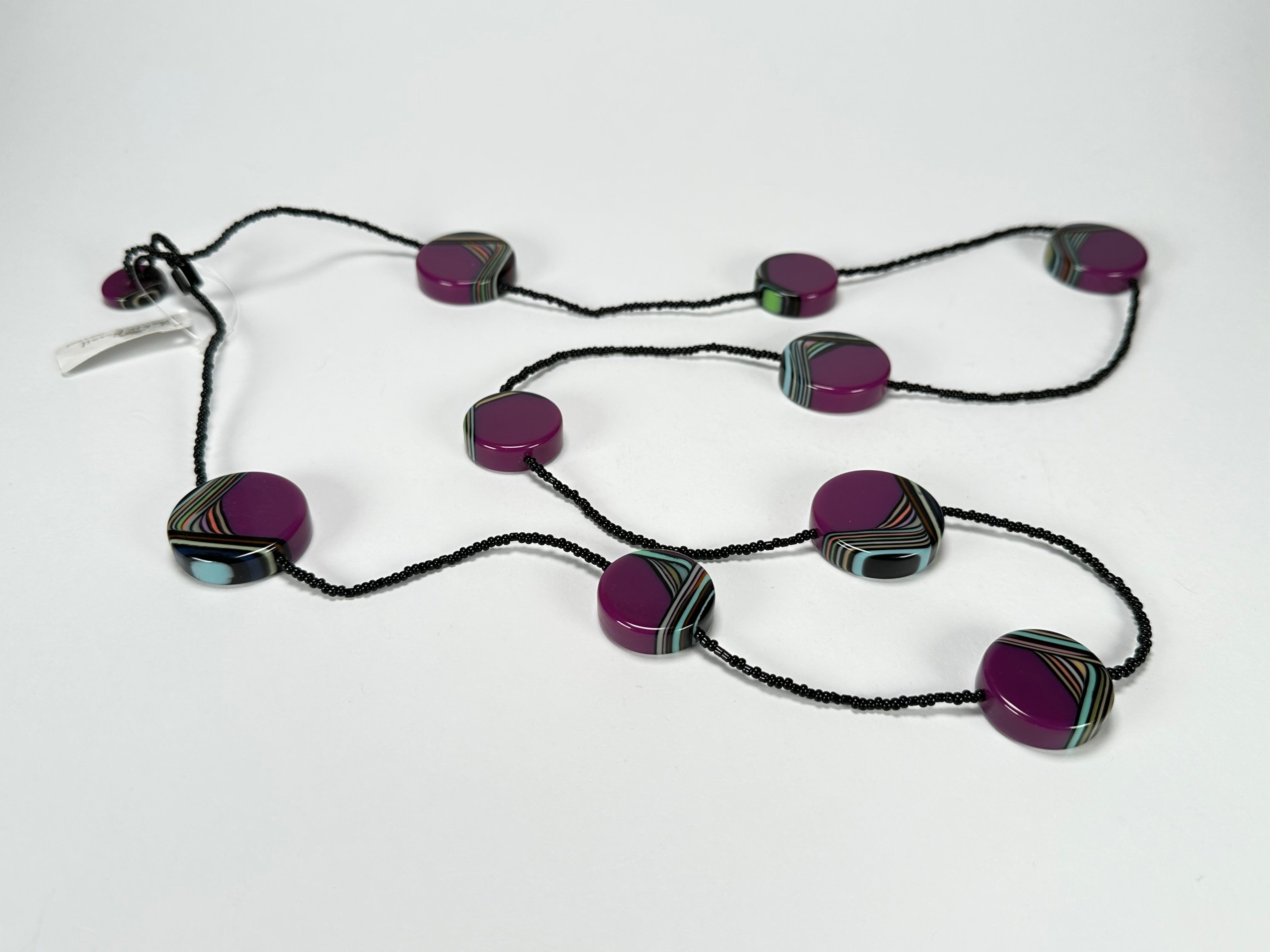 Jackie Brazil "Aida" Purple Swirls Discs With Beads Long Resin Necklace ( N3150 )