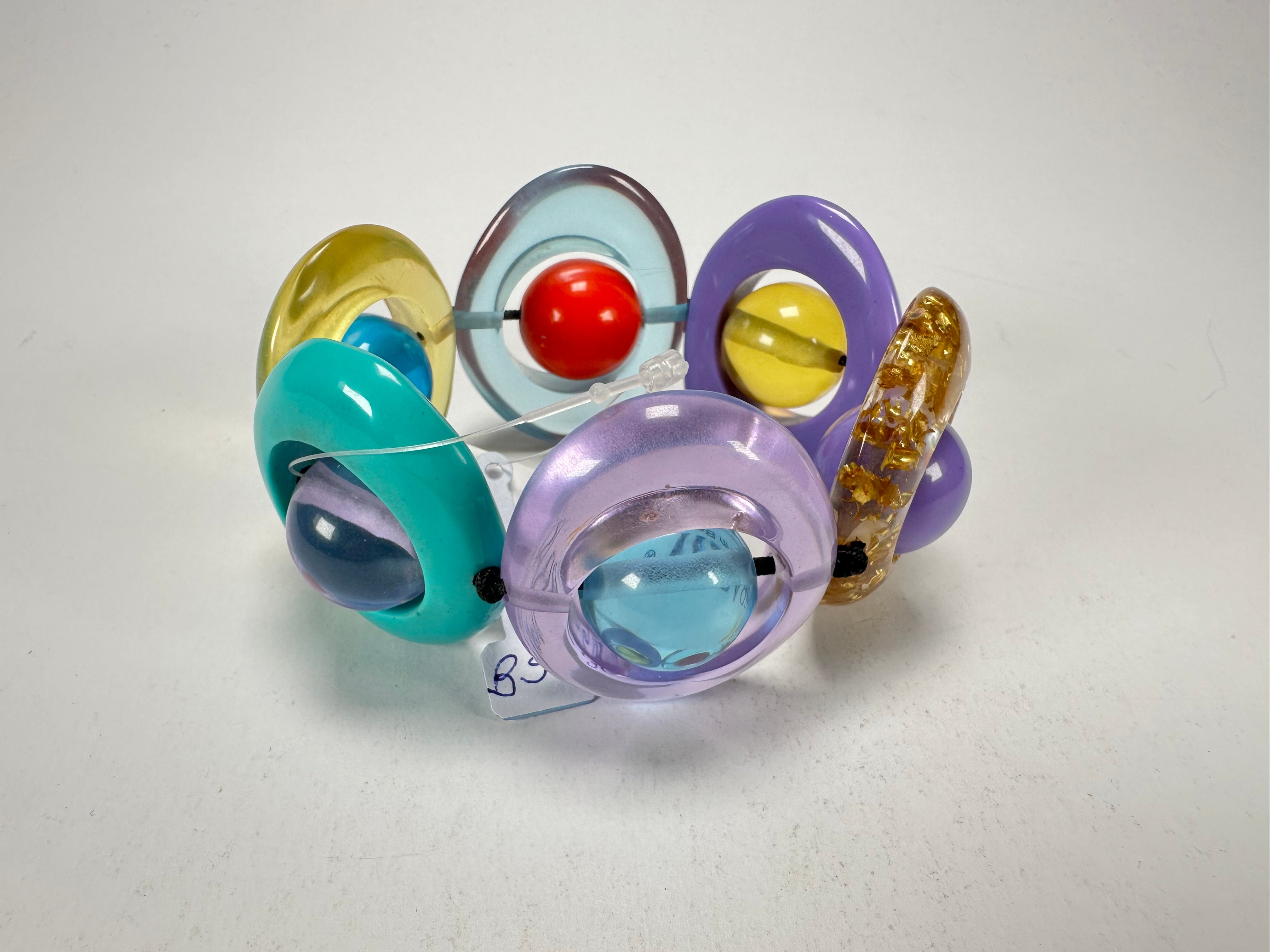 Jackie Brazil "Saturn" Transparent Paris Mix Disc & Ball Elastic Bracelet ( B0052 )