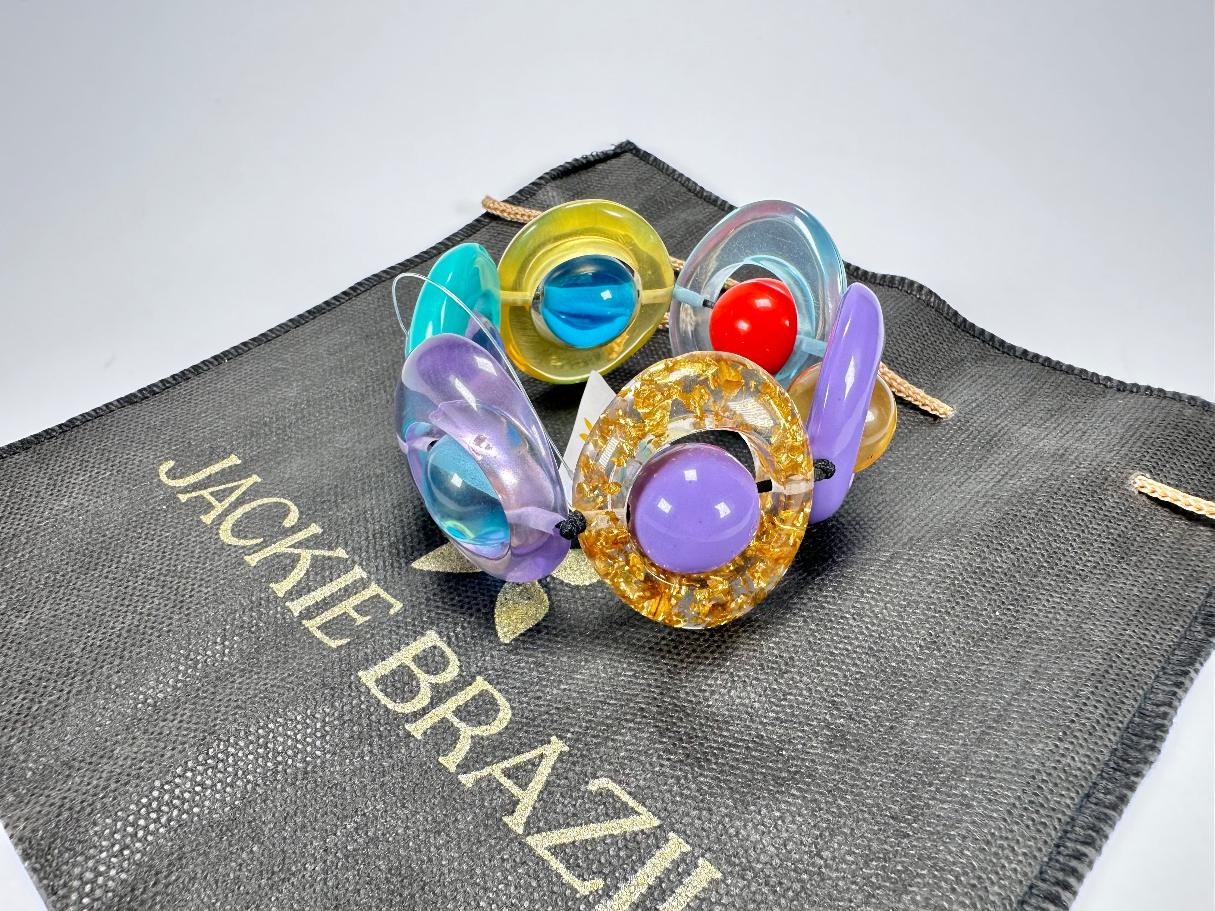 Jackie Brazil "Saturn" Transparent Paris Mix Disc & Ball Elastic Bracelet ( B0052 )