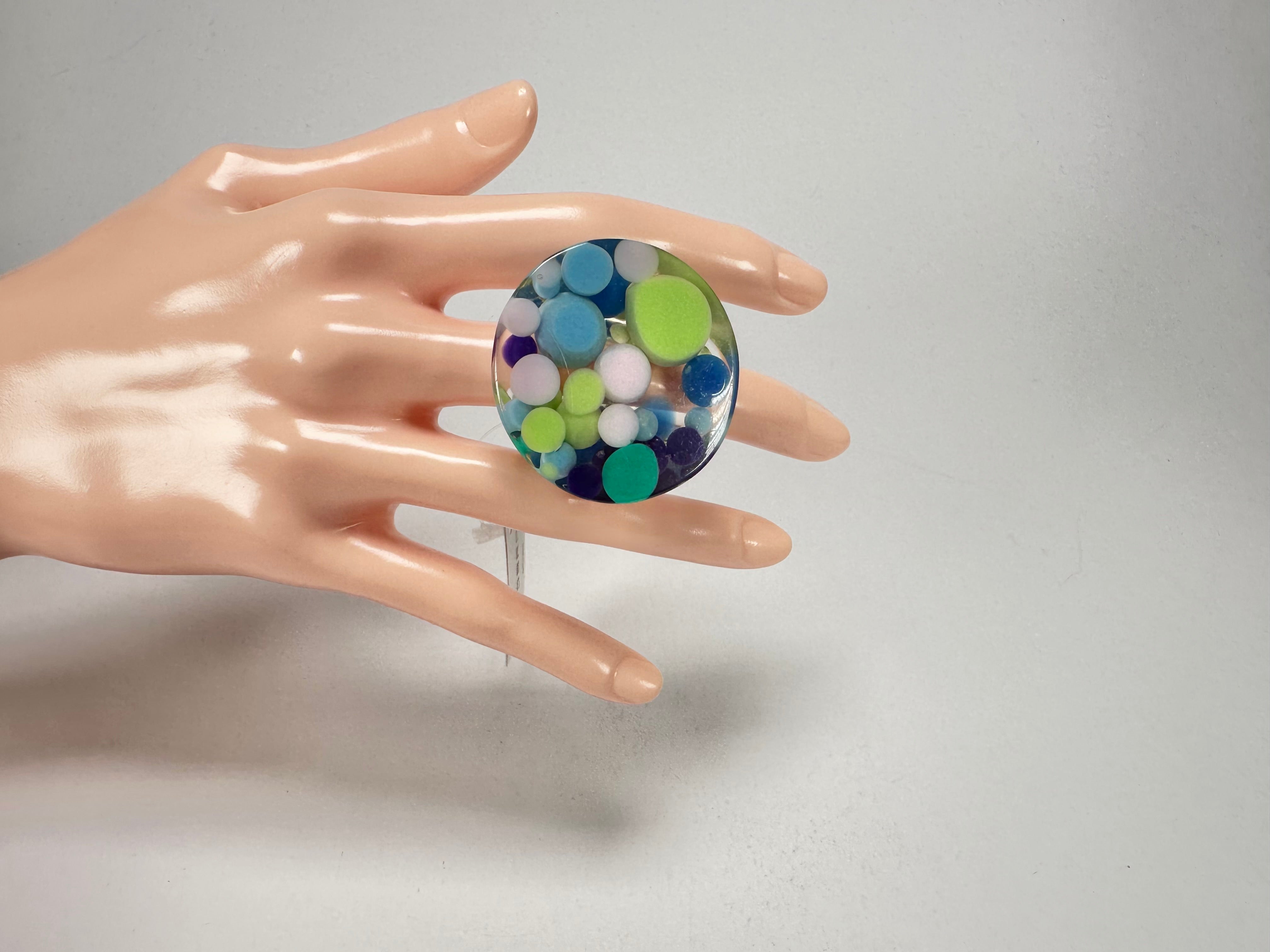 Jackie Brazil "Acrobatic" Flat Round Petite Blue Balls Spots Resin Ring ( R2536 ) Size UK P / US 7.5