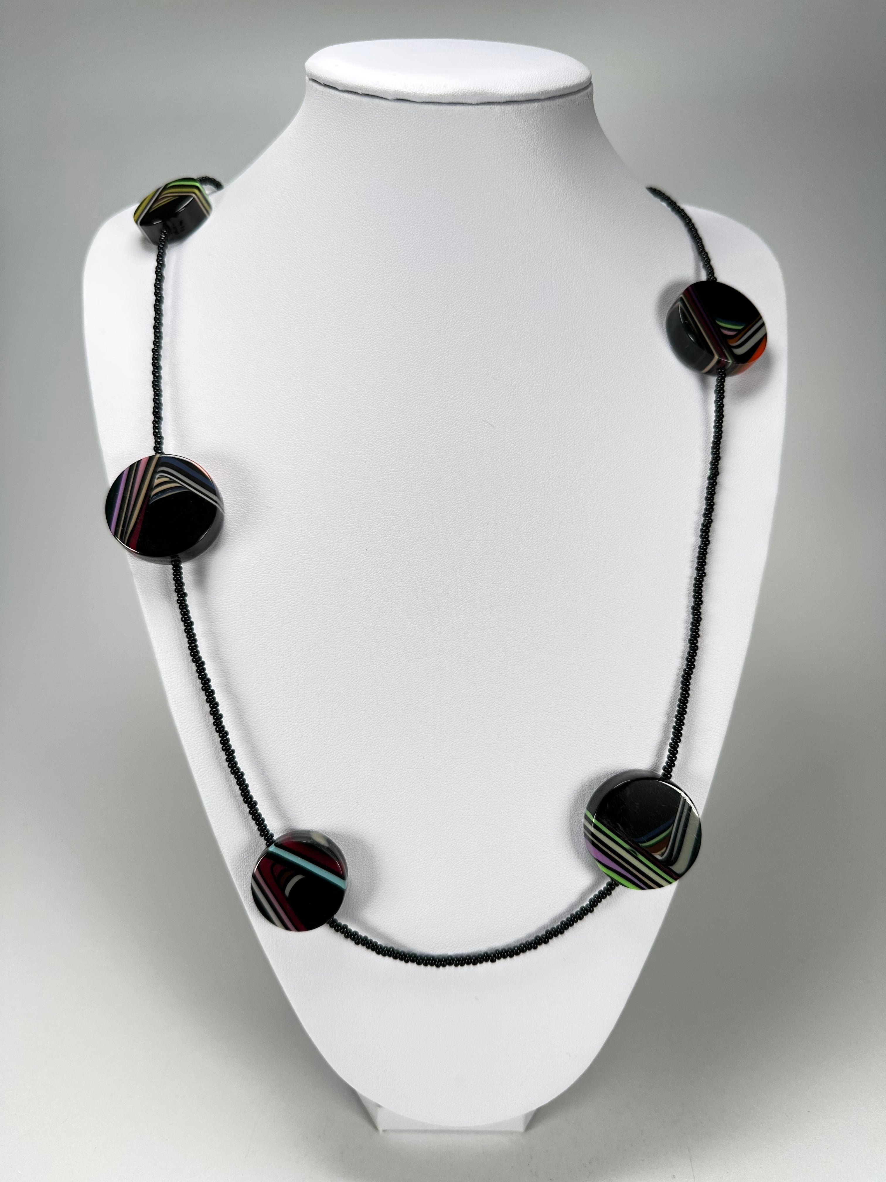 Jackie Brazil "Aida" Black Swirls Discs With Beads Long Resin Necklace ( N3150 )