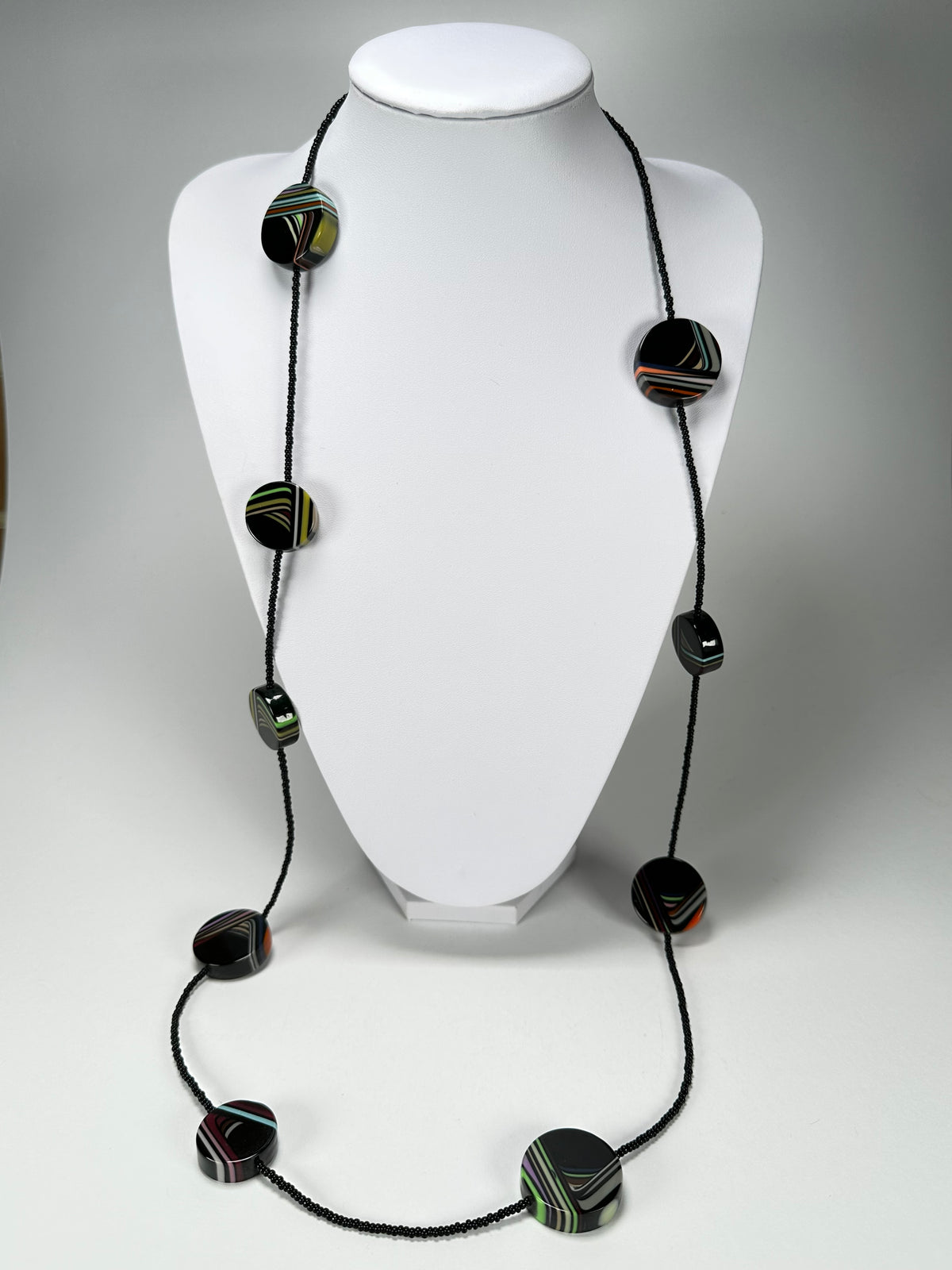 Jackie Brazil "Aida" Black Swirls Discs With Beads Long Resin Necklace ( N3150 )