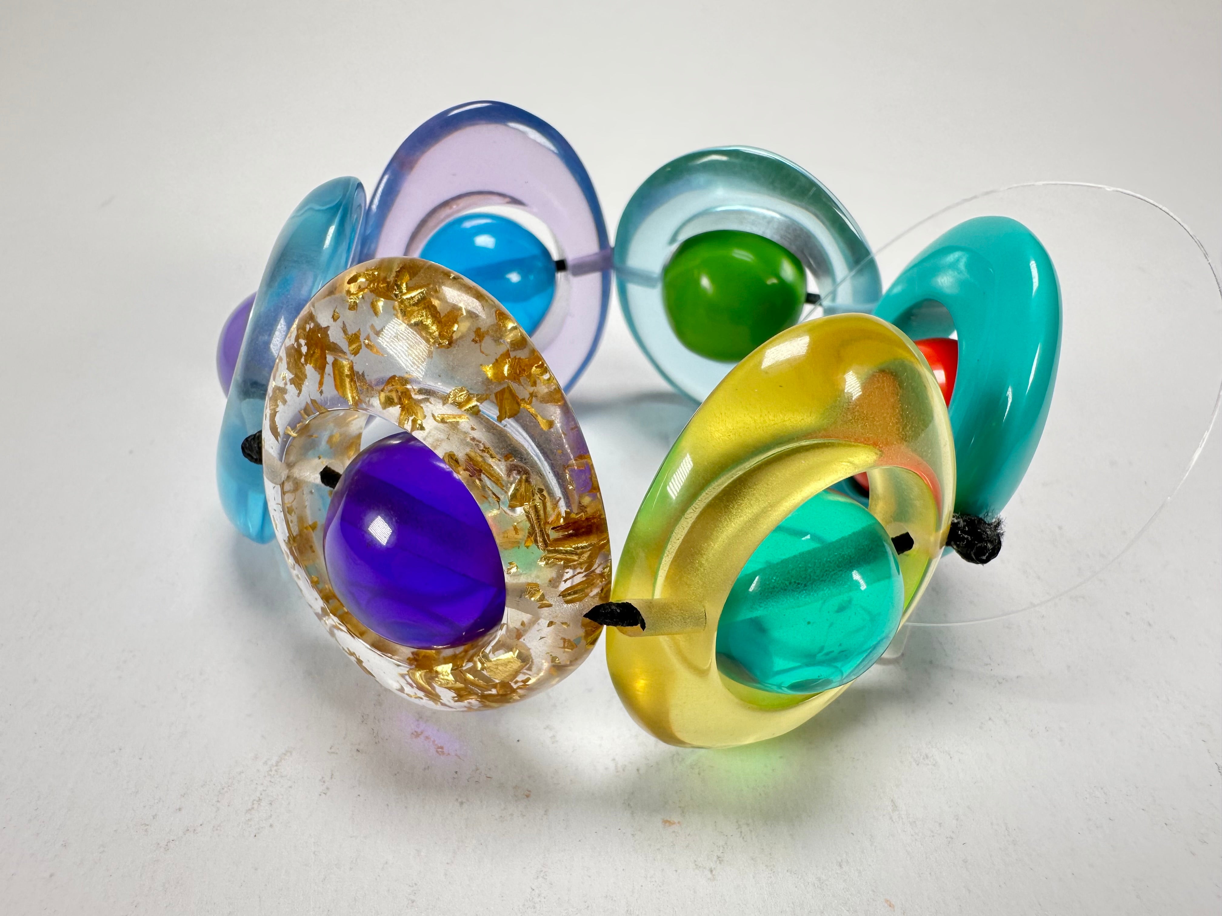 Jackie Brazil "Saturn" Transparent Paris Mix Disc & Ball Elastic Bracelet ( B0052 )