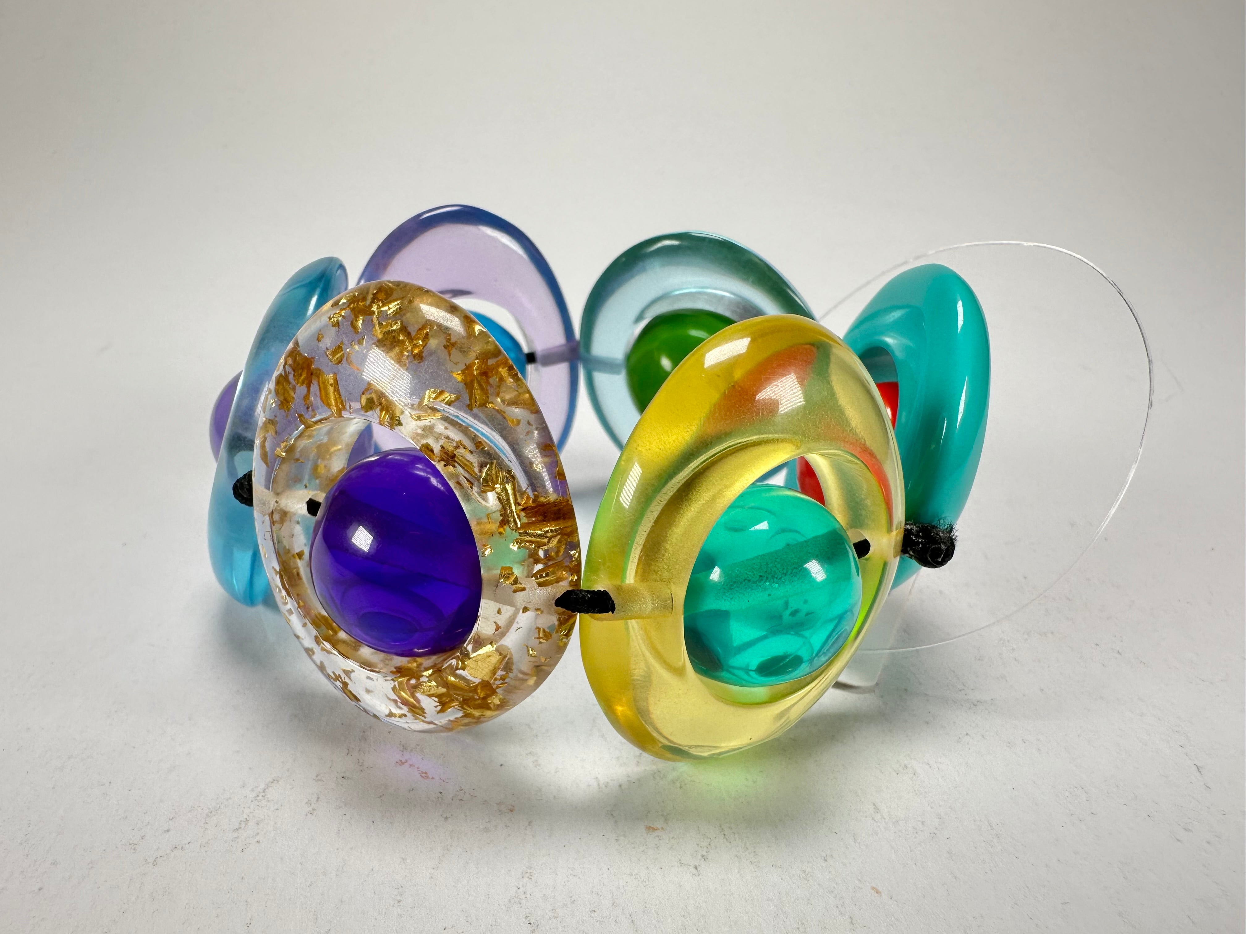 Jackie Brazil "Saturn" Transparent Paris Mix Disc & Ball Elastic Bracelet ( B0052 )
