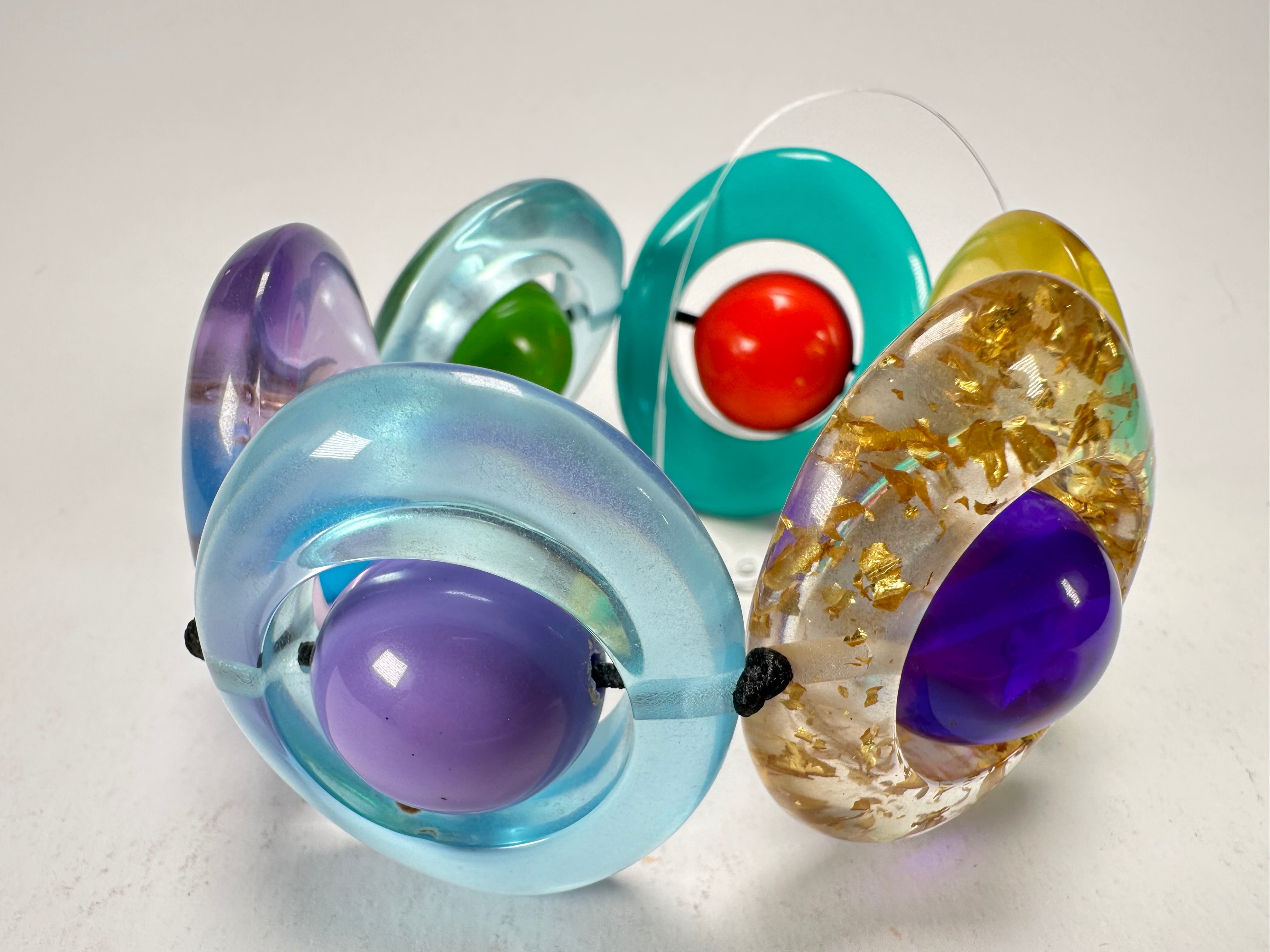 Jackie Brazil "Saturn" Transparent Paris Mix Disc & Ball Elastic Bracelet ( B0052 )