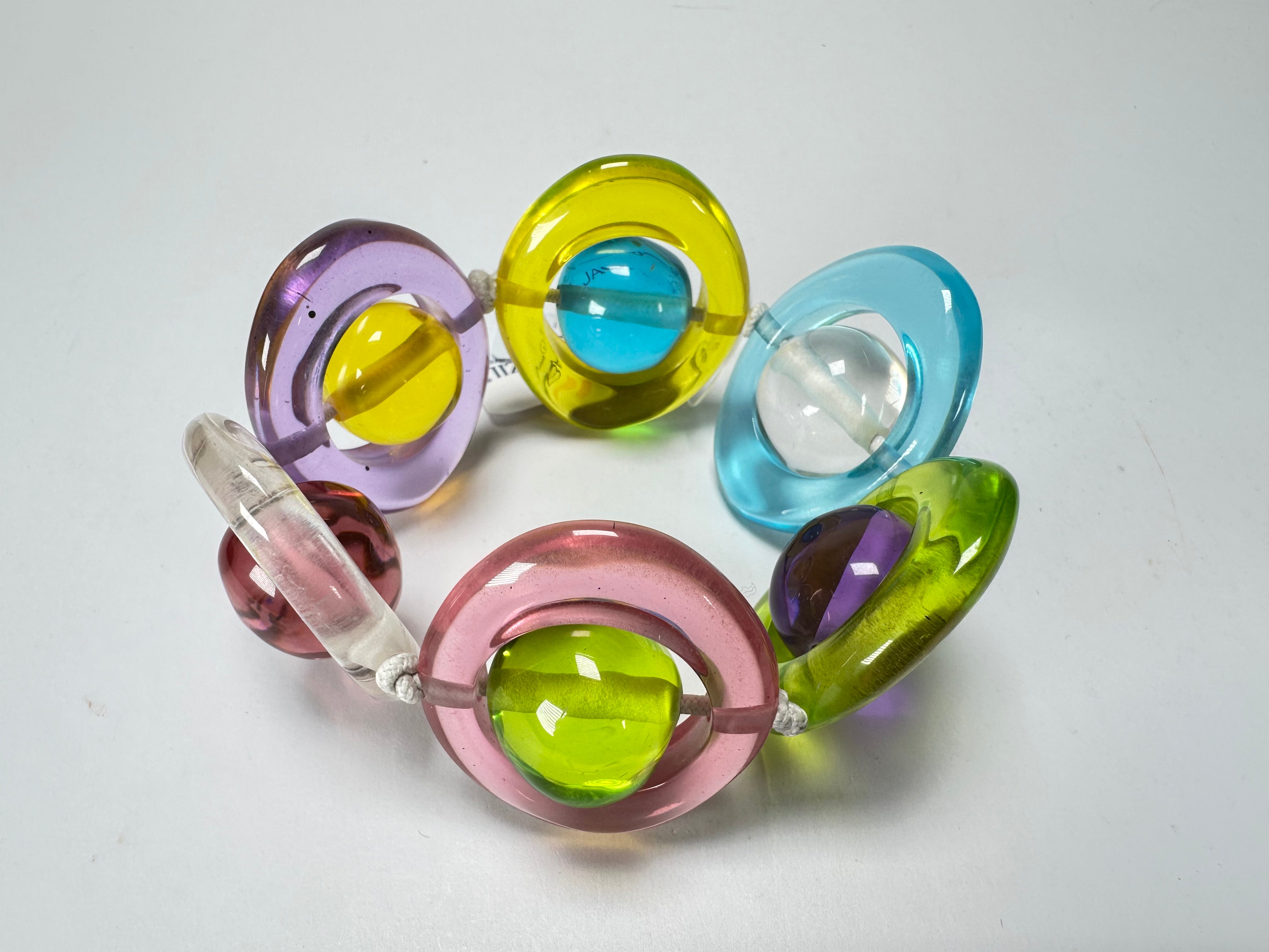 Jackie Brazil "Saturn" Transparent Disc & Ball Elastic Bracelet ( B0052 )