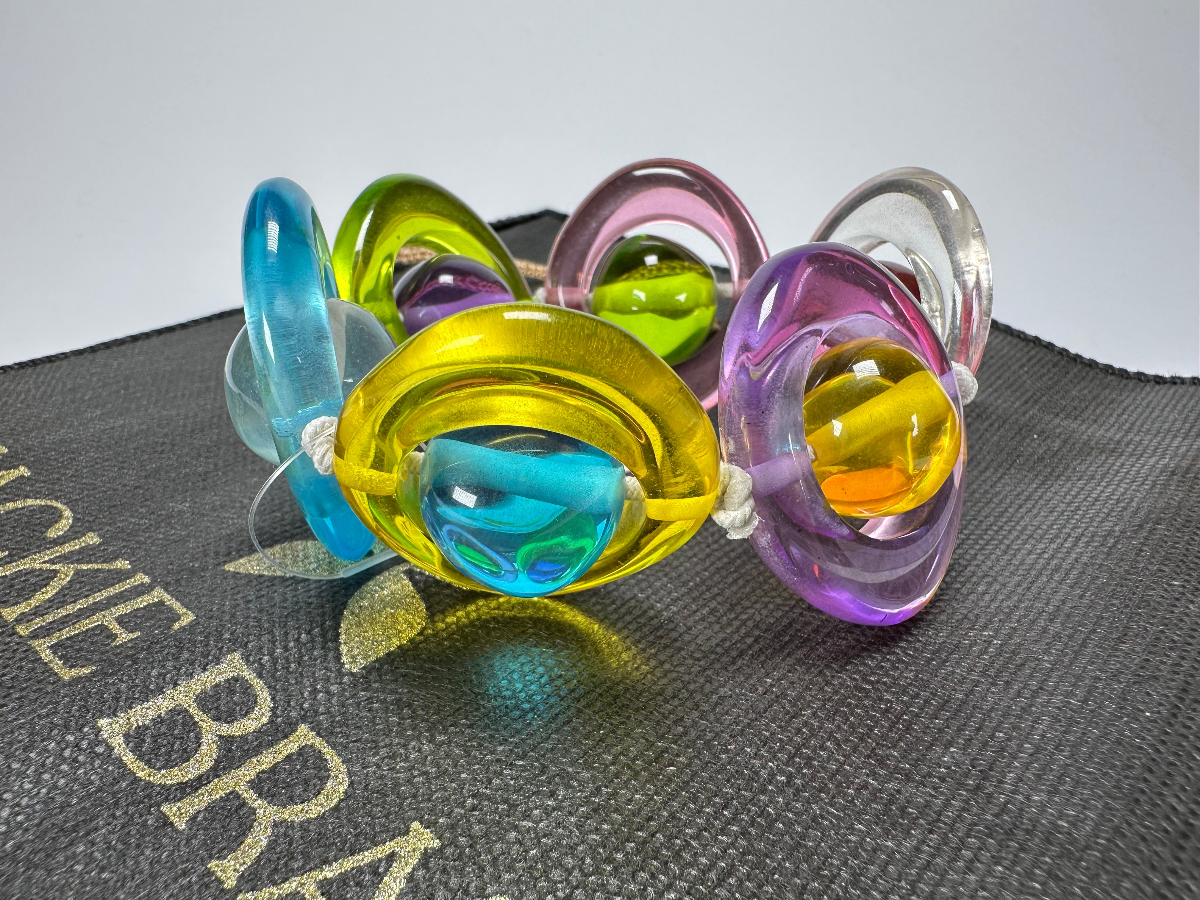 Jackie Brazil "Saturn" Transparent Disc & Ball Elastic Bracelet ( B0052 )