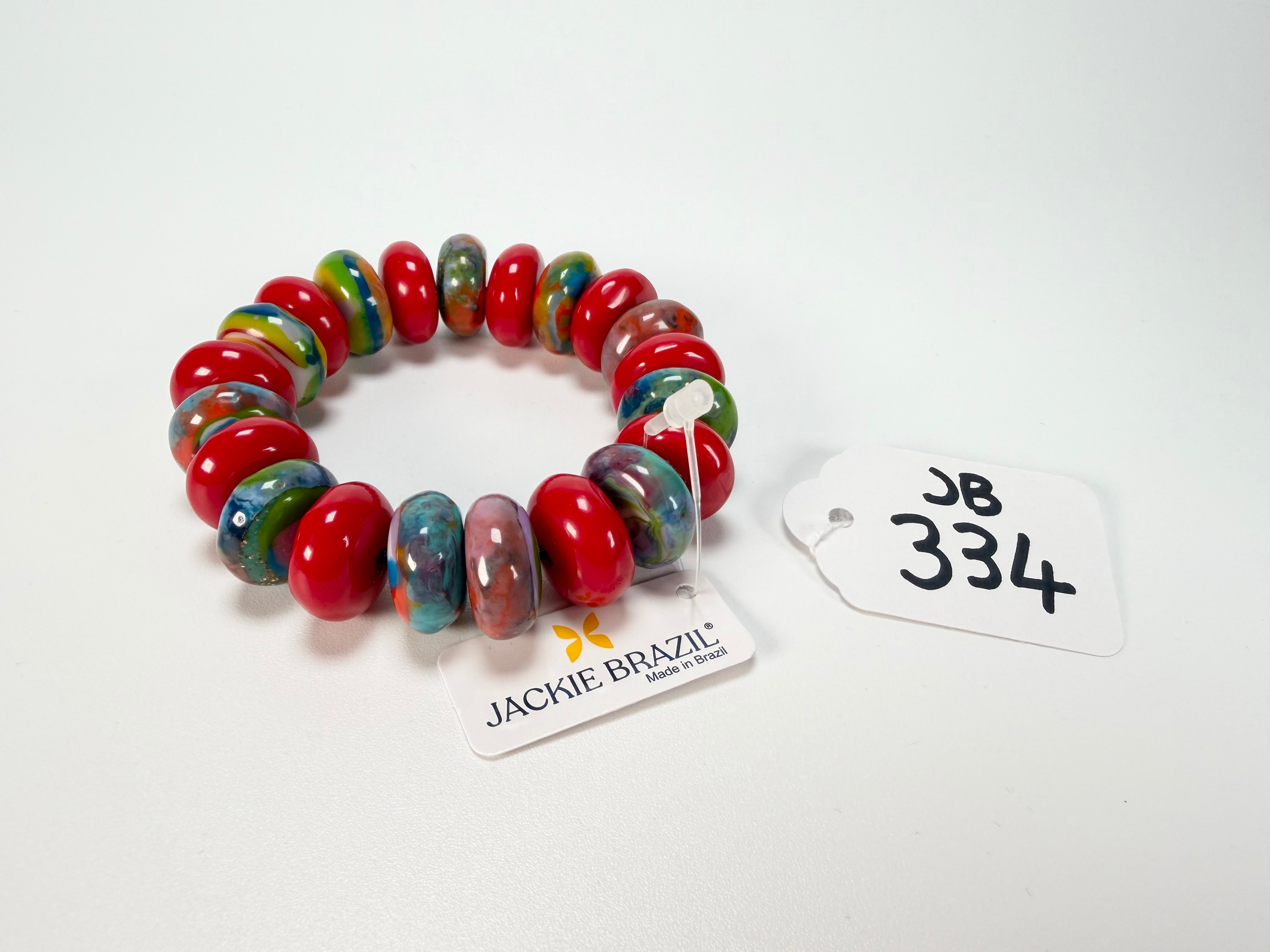 Jackie Brazil "Bela" Red Gloss & Kandinsky Elasticated Mini Wheels Resin Bracelet ( B0920 )
