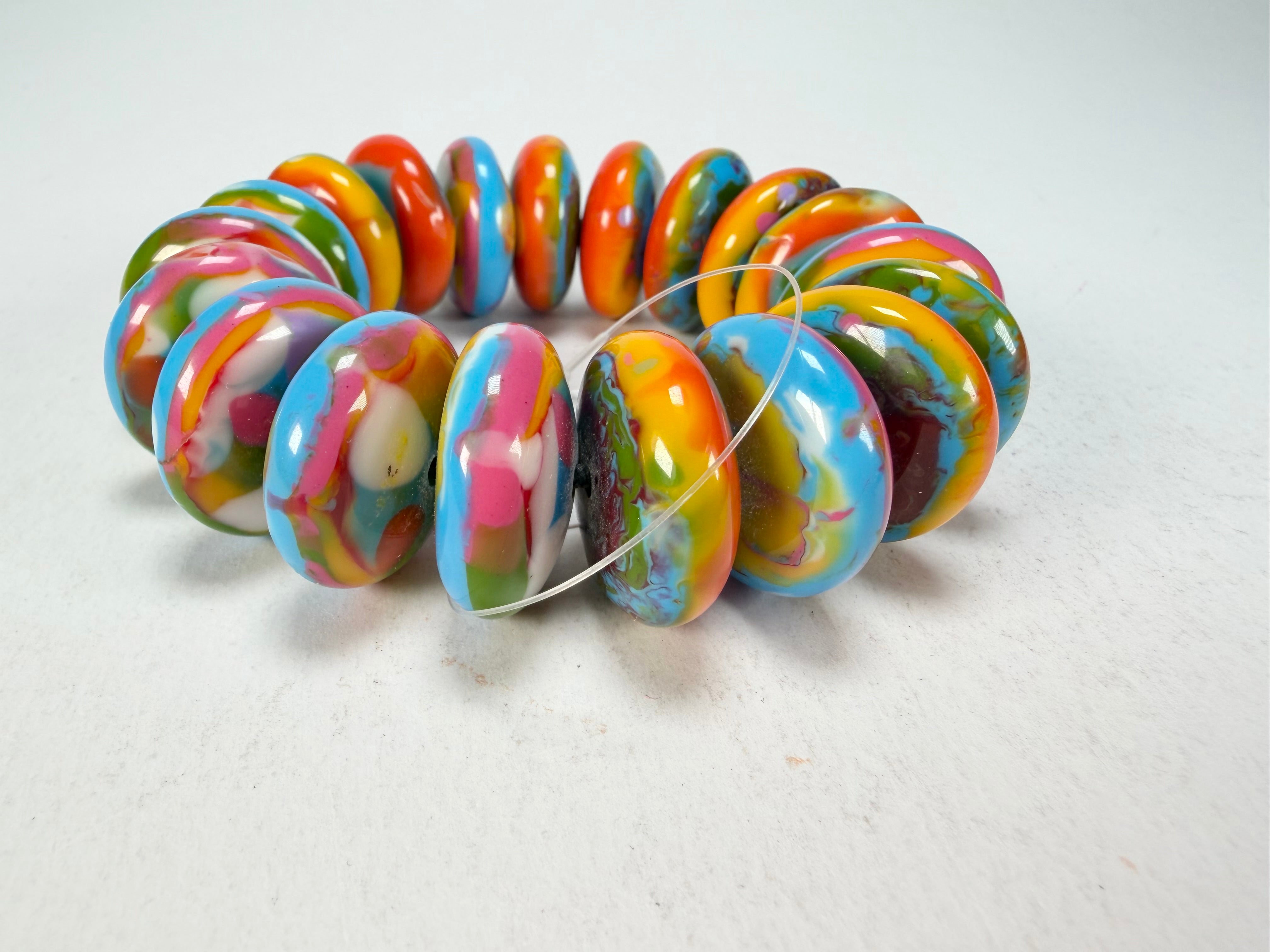 Jackie Brazil "Ana" Kandinsky Elasticated Wheels Resin Bracelet ( B0910 )