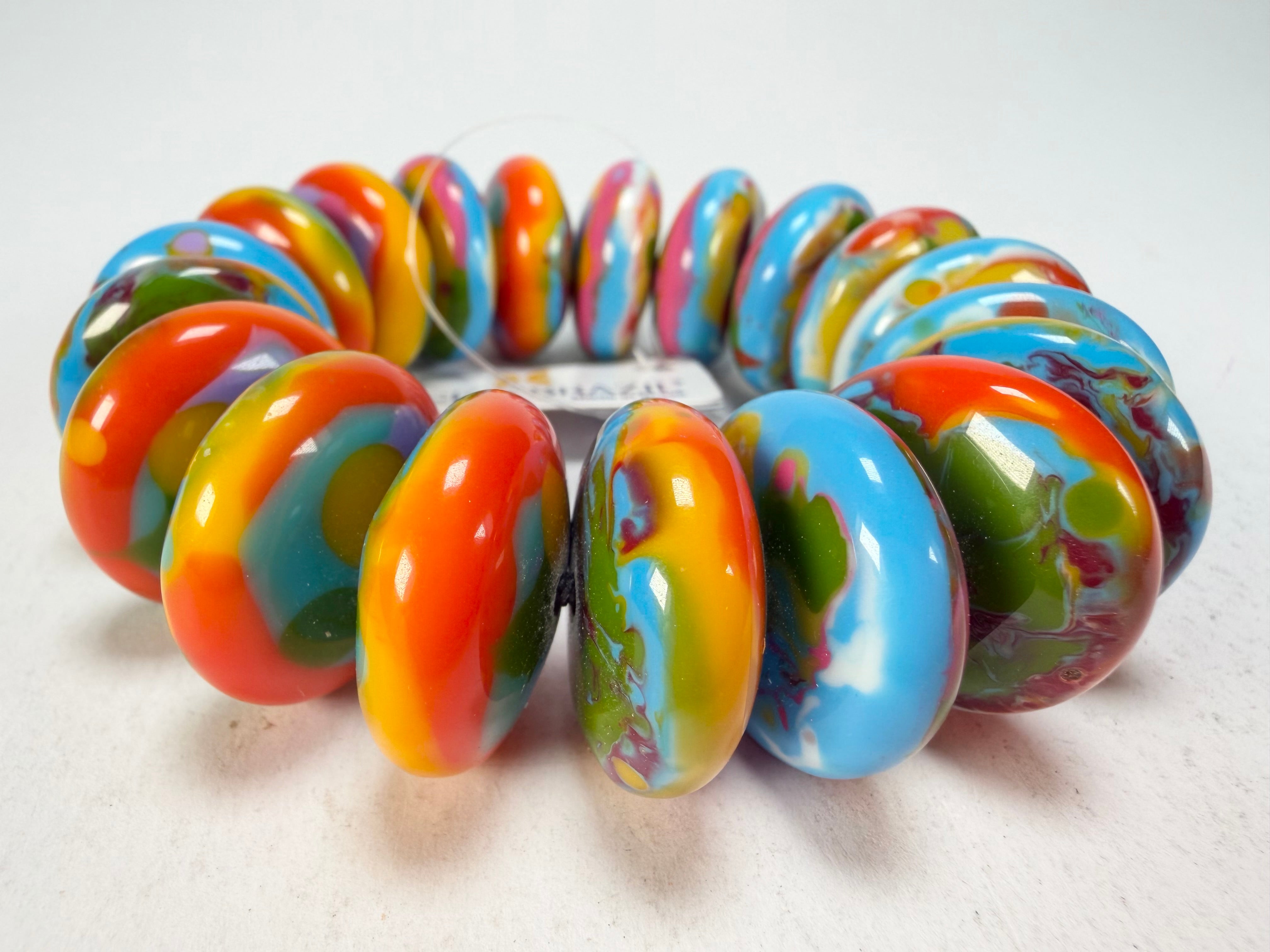 Jackie Brazil "Ana" Kandinsky Elasticated Wheels Resin Bracelet ( B0910 )