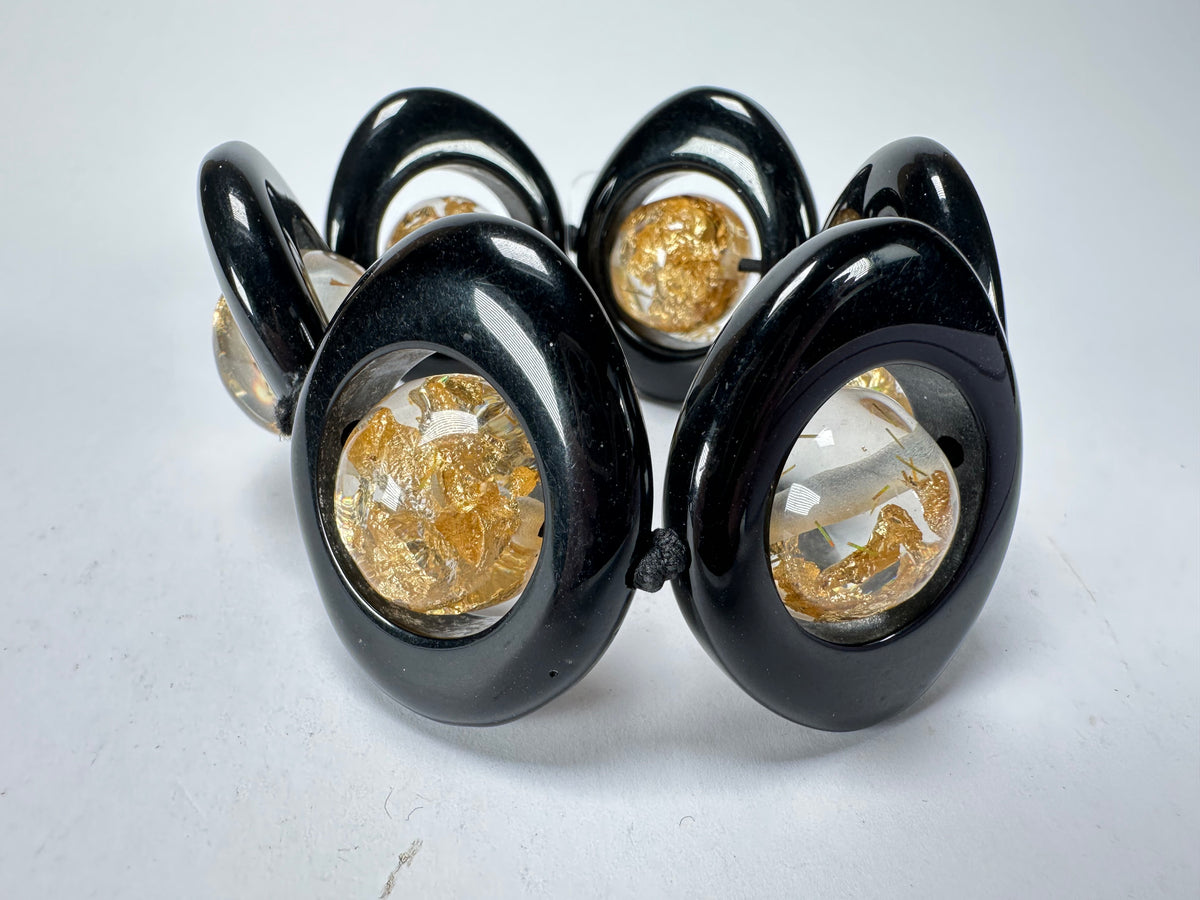 Jackie Brazil "Saturn" Black & Gold Flakes Disc & Ball Elastic Bracelet ( B0052 )