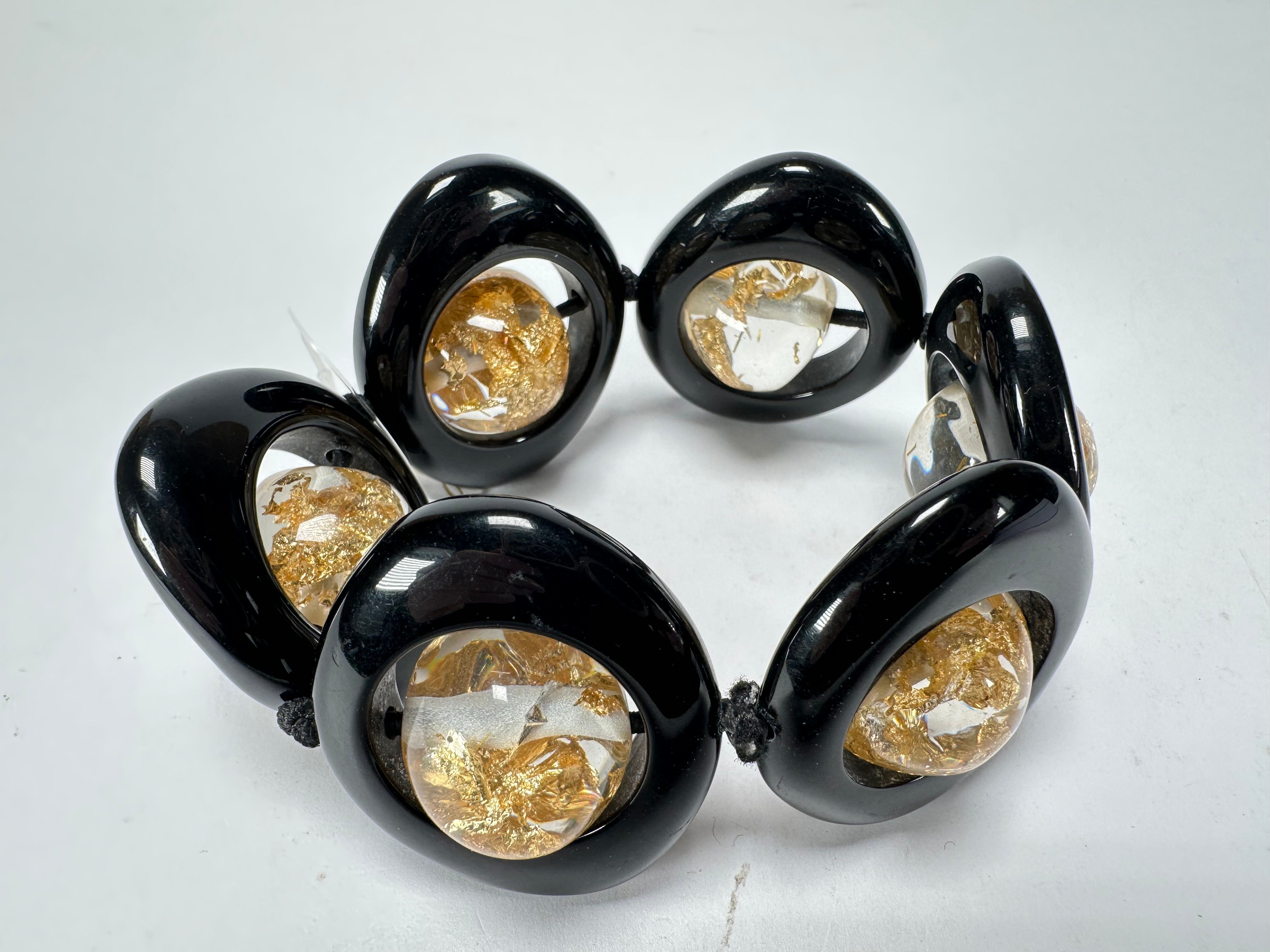 Jackie Brazil "Saturn" Black & Gold Flakes Disc & Ball Elastic Bracelet ( B0052 )