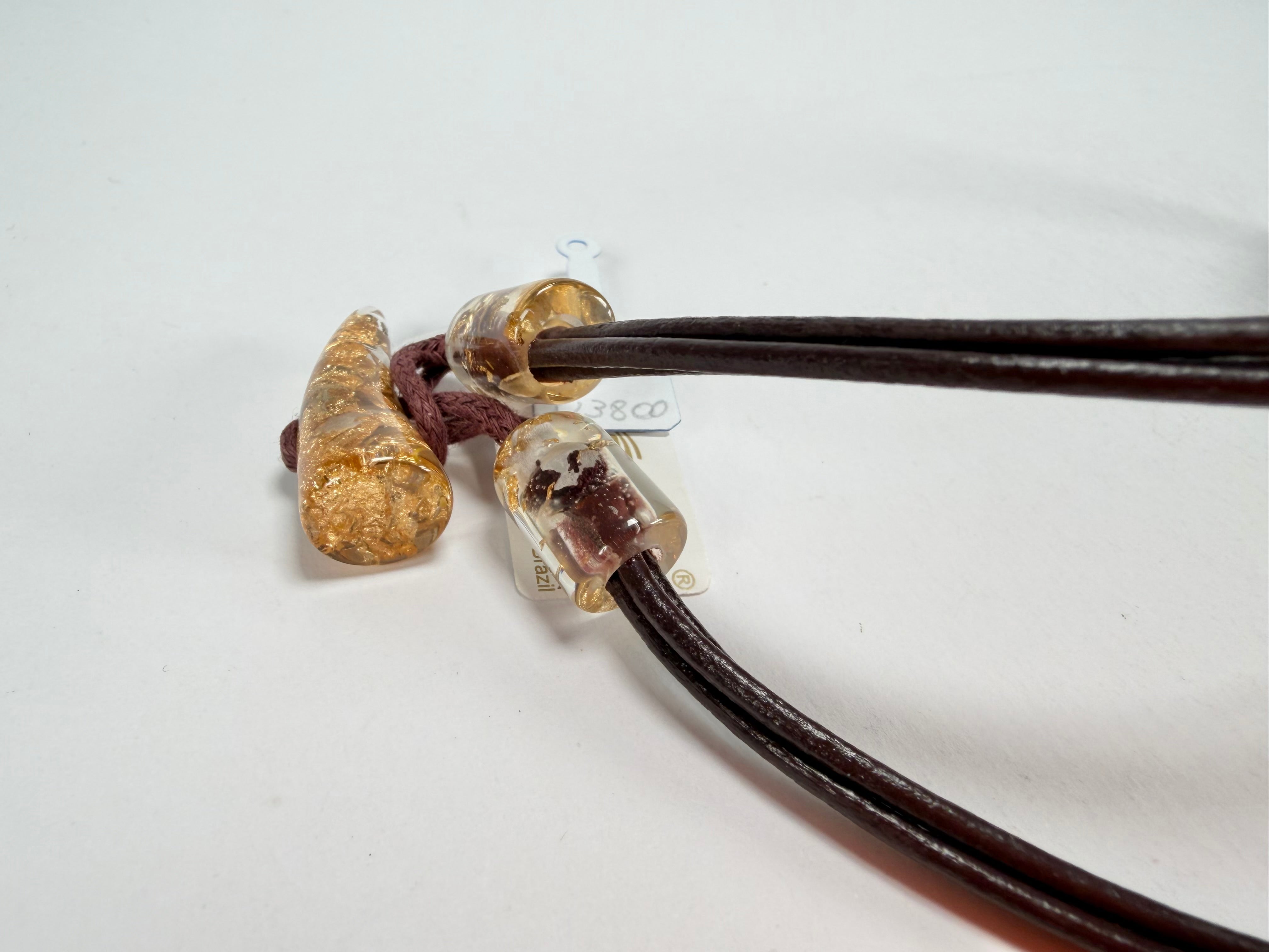 Jackie Brazil "Gold Flakes" Large Disk On Three Cords Resin Necklace ( N3800 )