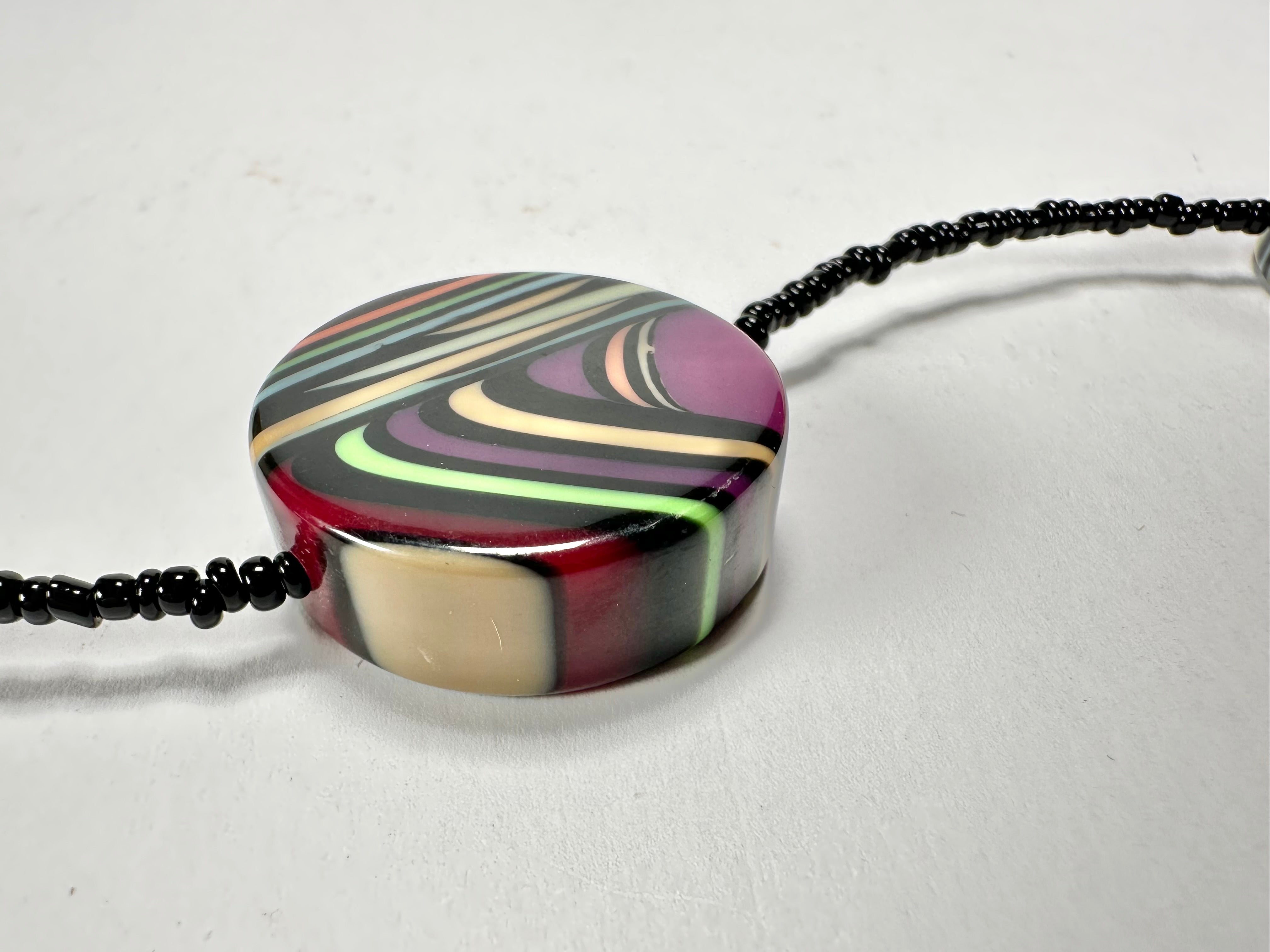 Jackie Brazil "Aida" Purple Swirls Discs With Beads Long Resin Necklace ( N3150 )