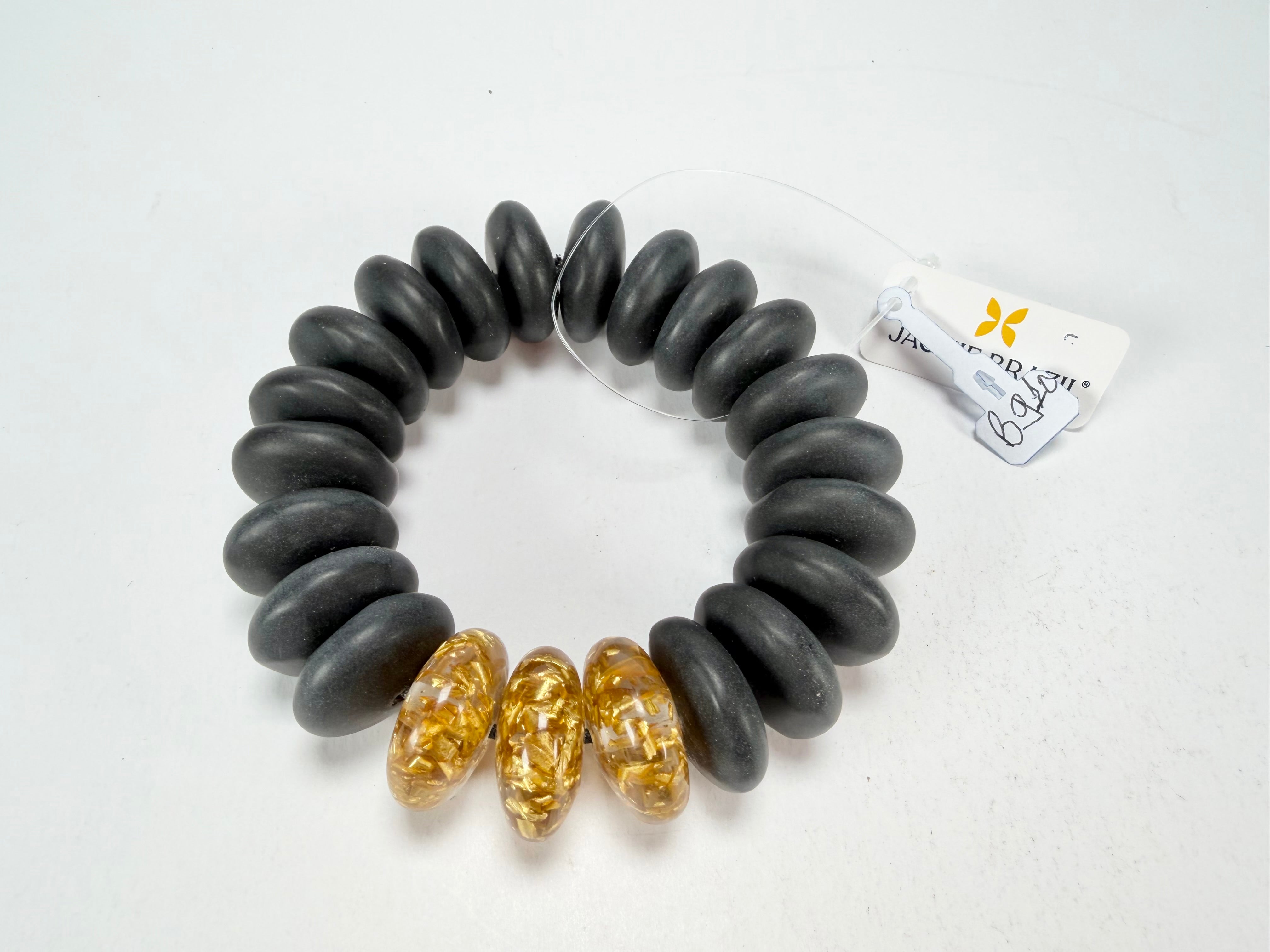 Jackie Brazil "Ana" Black Matt & Gold Flakes Mix Elasticated Wheels Resin Bracelet ( B0910 )