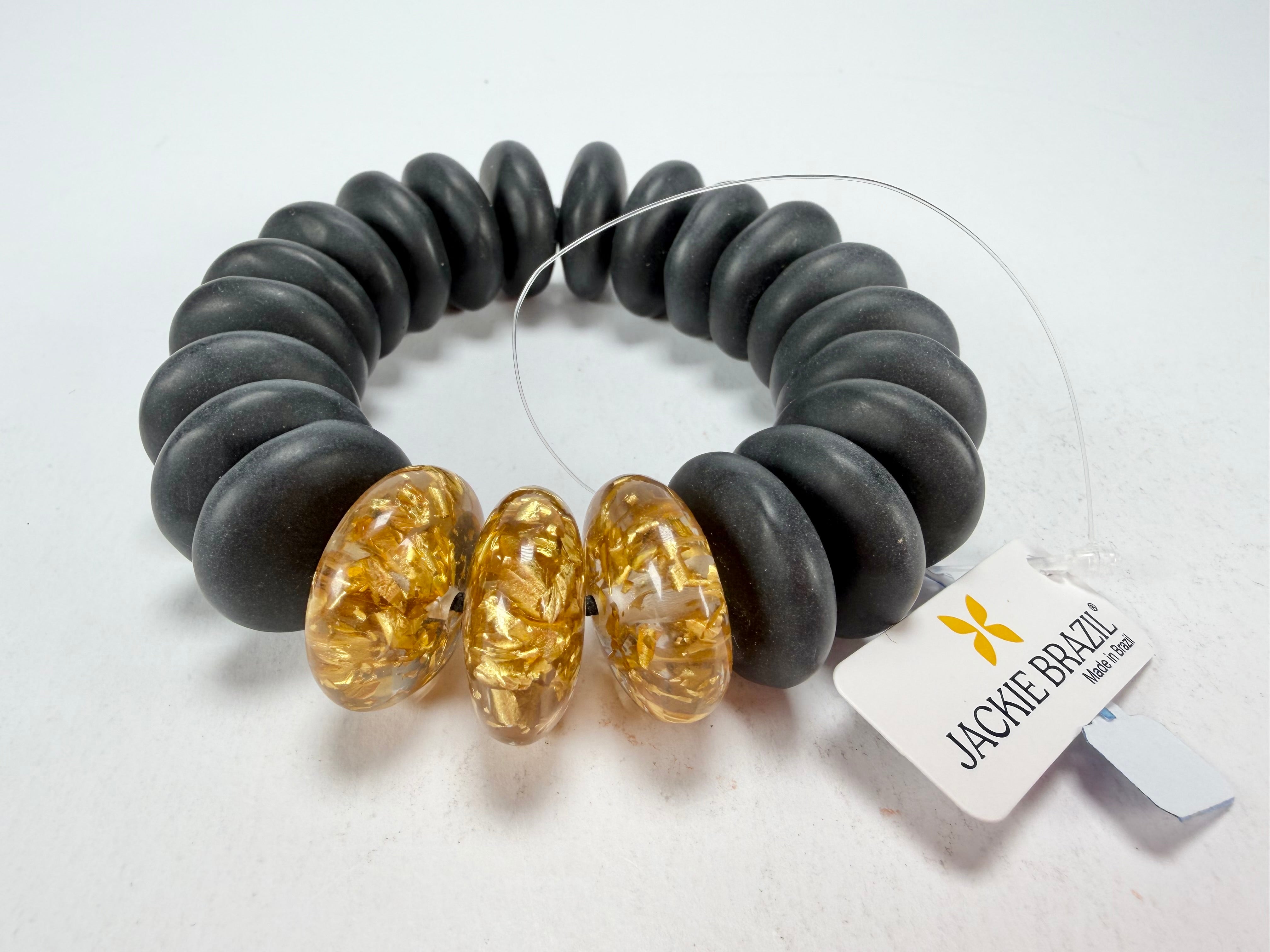 Jackie Brazil "Ana" Black Matt & Gold Flakes Mix Elasticated Wheels Resin Bracelet ( B0910 )