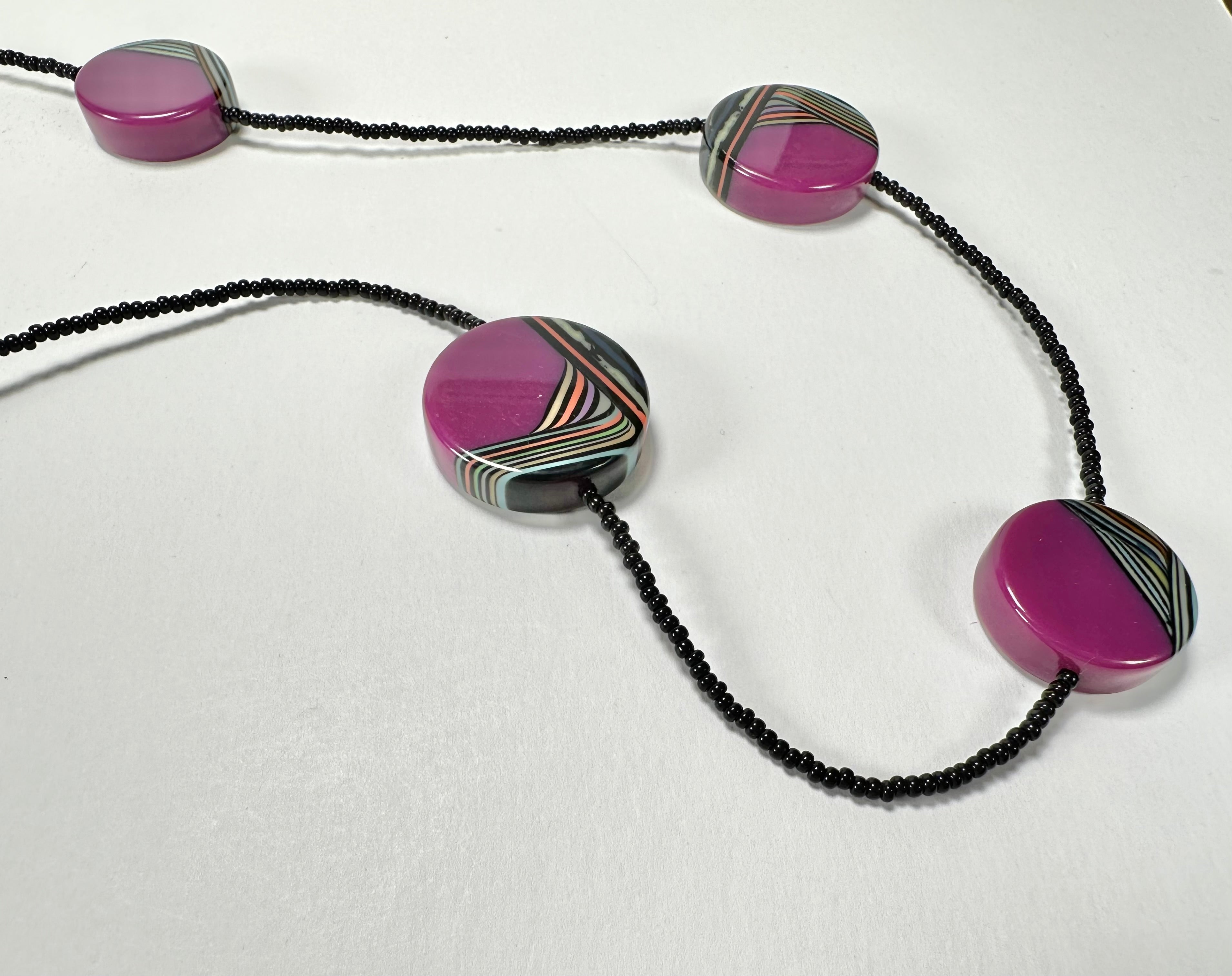 Jackie Brazil "Aida" Purple Swirls Discs With Beads Long Resin Necklace ( N3150 )