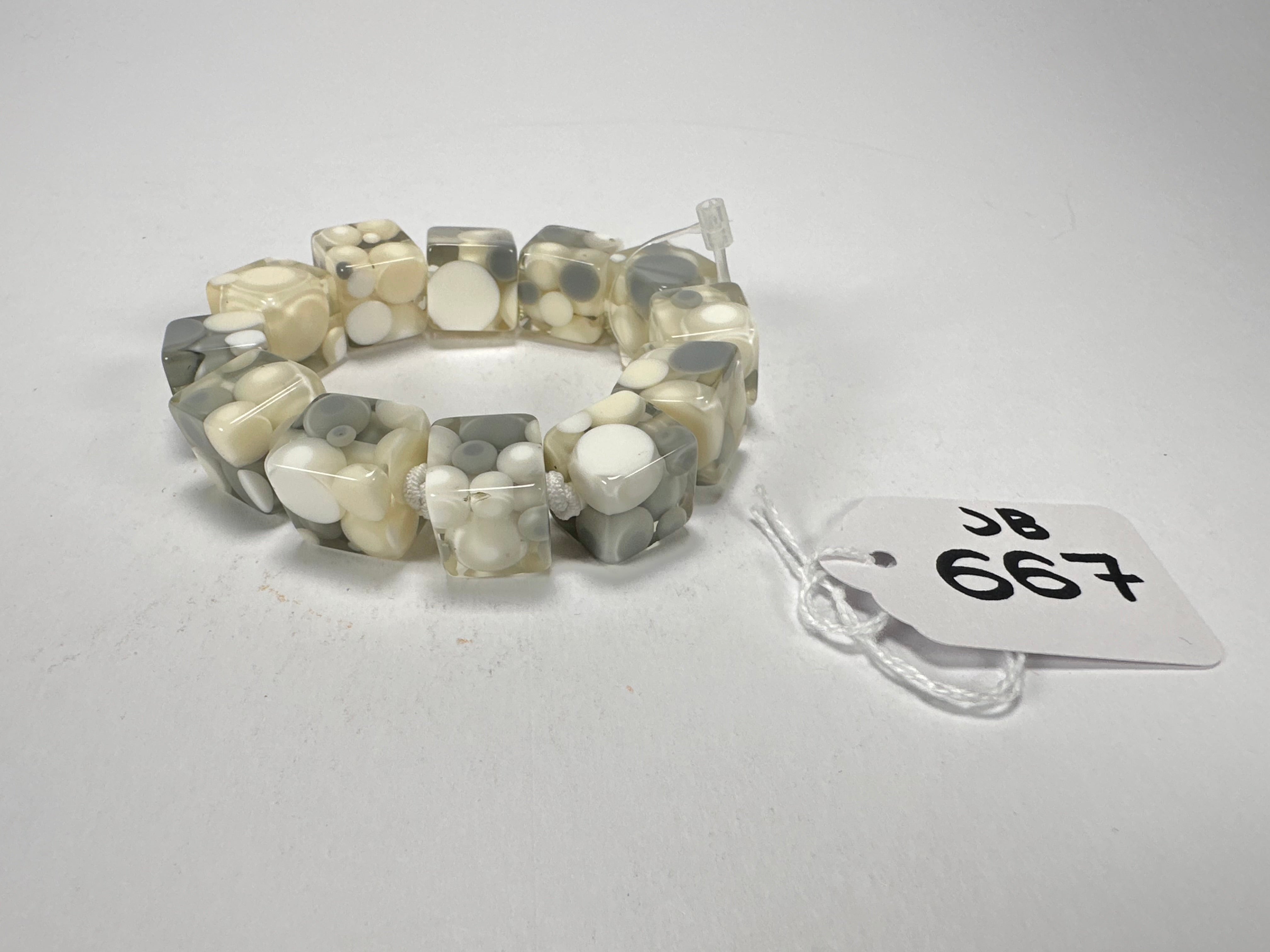 Jackie Brazil "Spots" Spotted Cubes On Elastic Cream Mix Resin Bracelet ( B1284 )