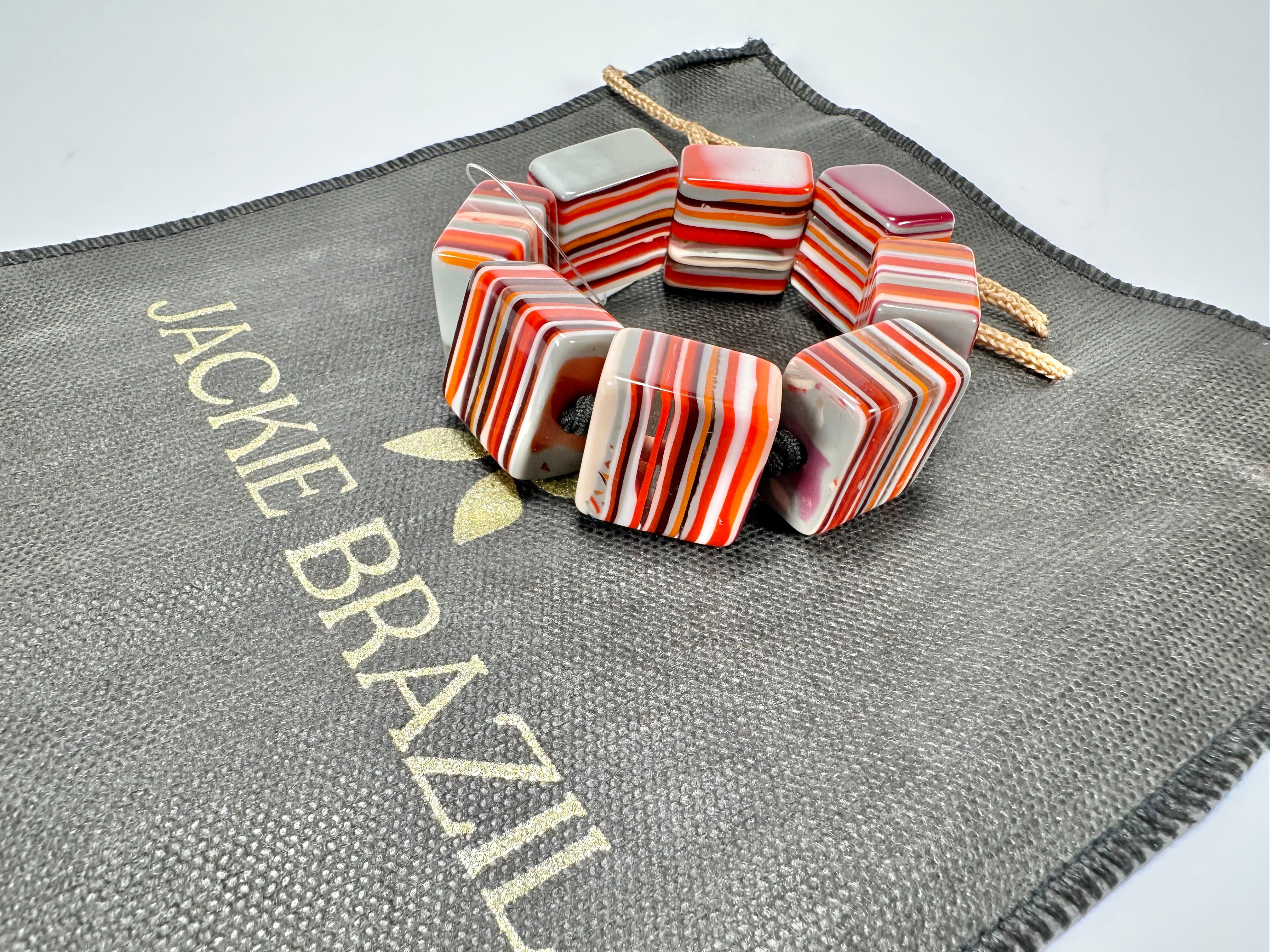 Jackie Brazil "Gala" Liquorice Half Rectangles On Elastic Orange Mix Bracelet ( B0778 )