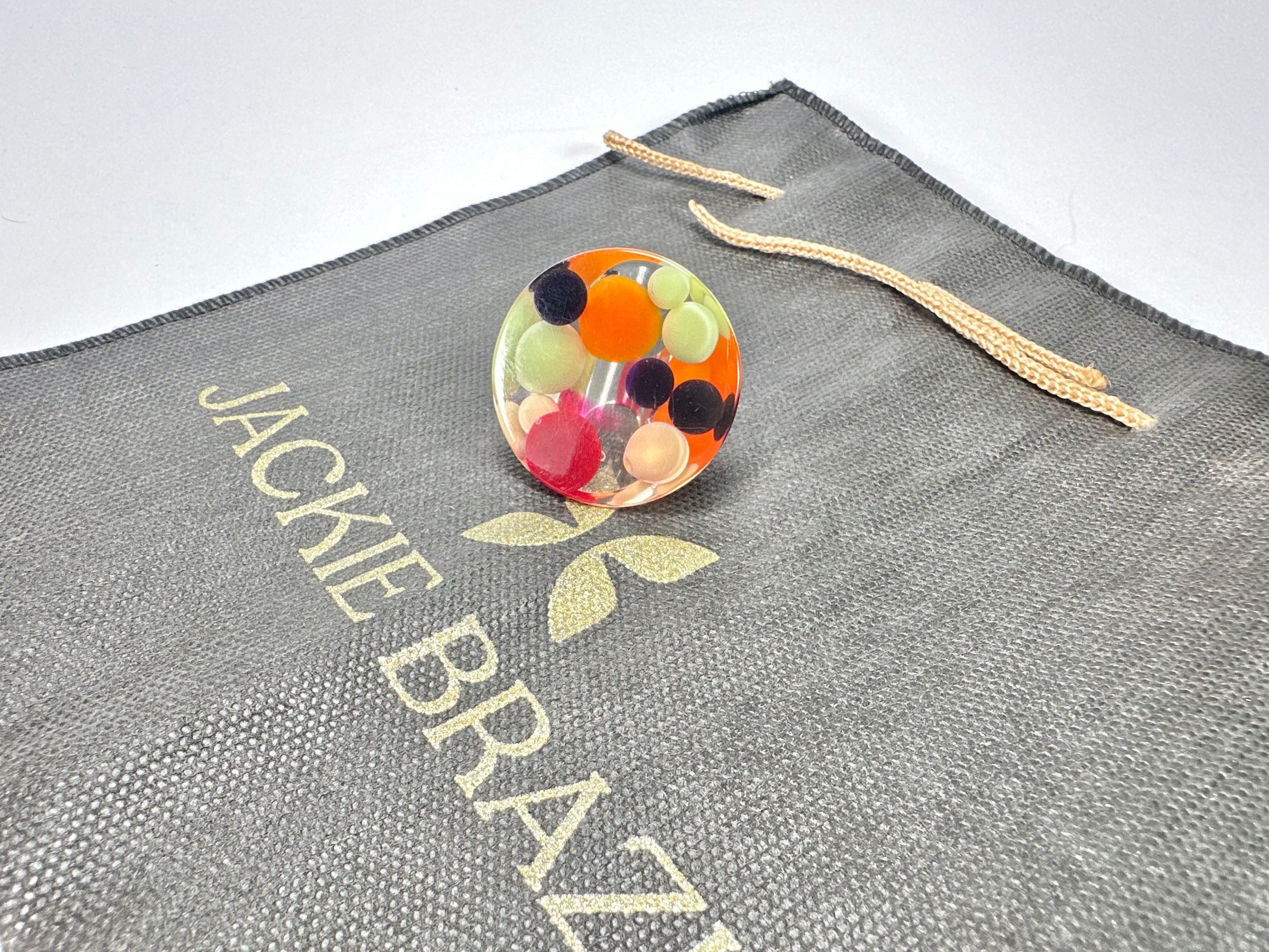 Jackie Brazil "Acrobatic" Flat Round Petite Green Balls Spots Resin Ring ( R2536 ) Size UK P / US 7.5