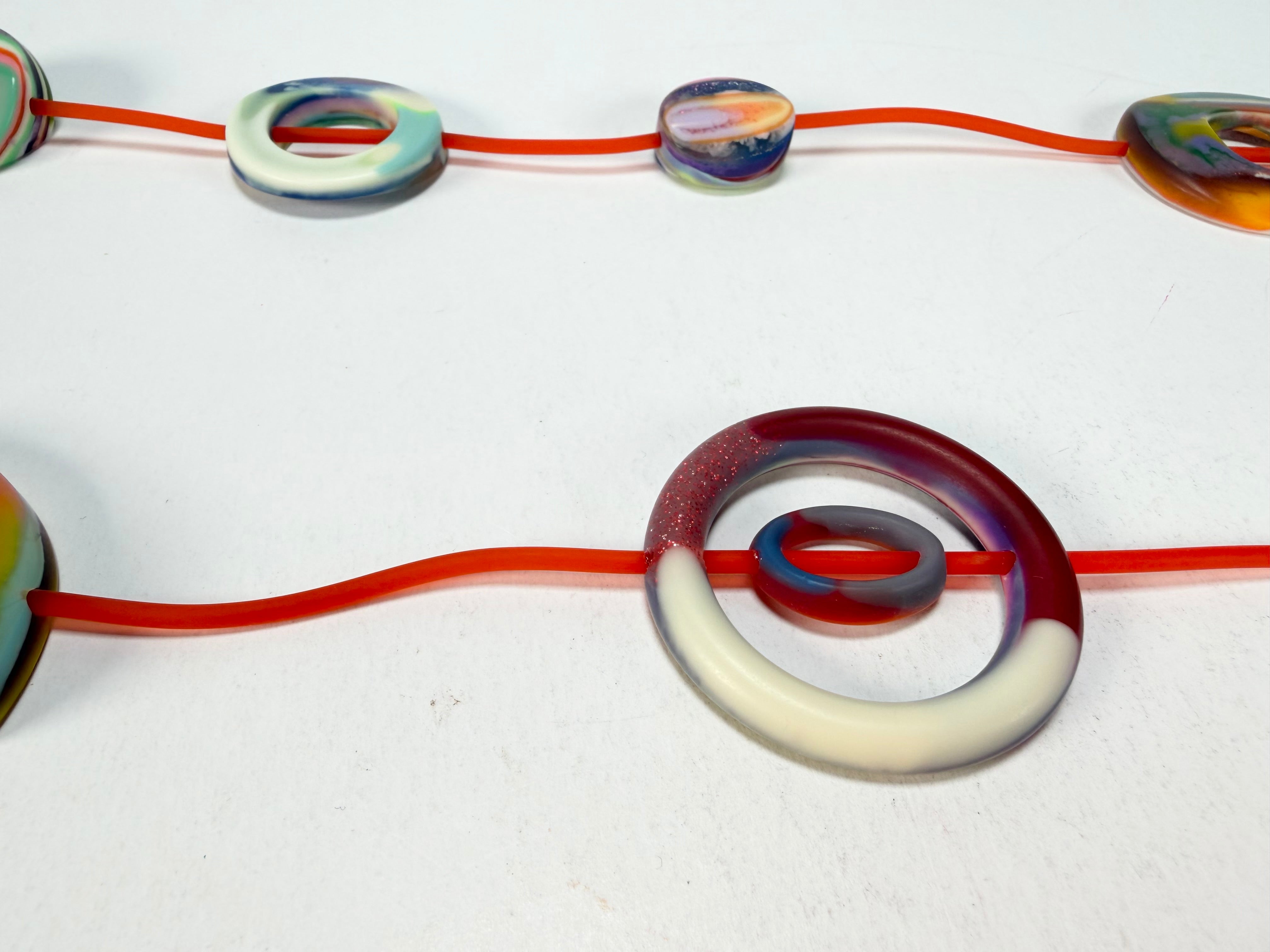 Jackie Brazil "Cool" Kandinsky Tropicalia Resin Necklace on Rubber Cord ( N2361 )