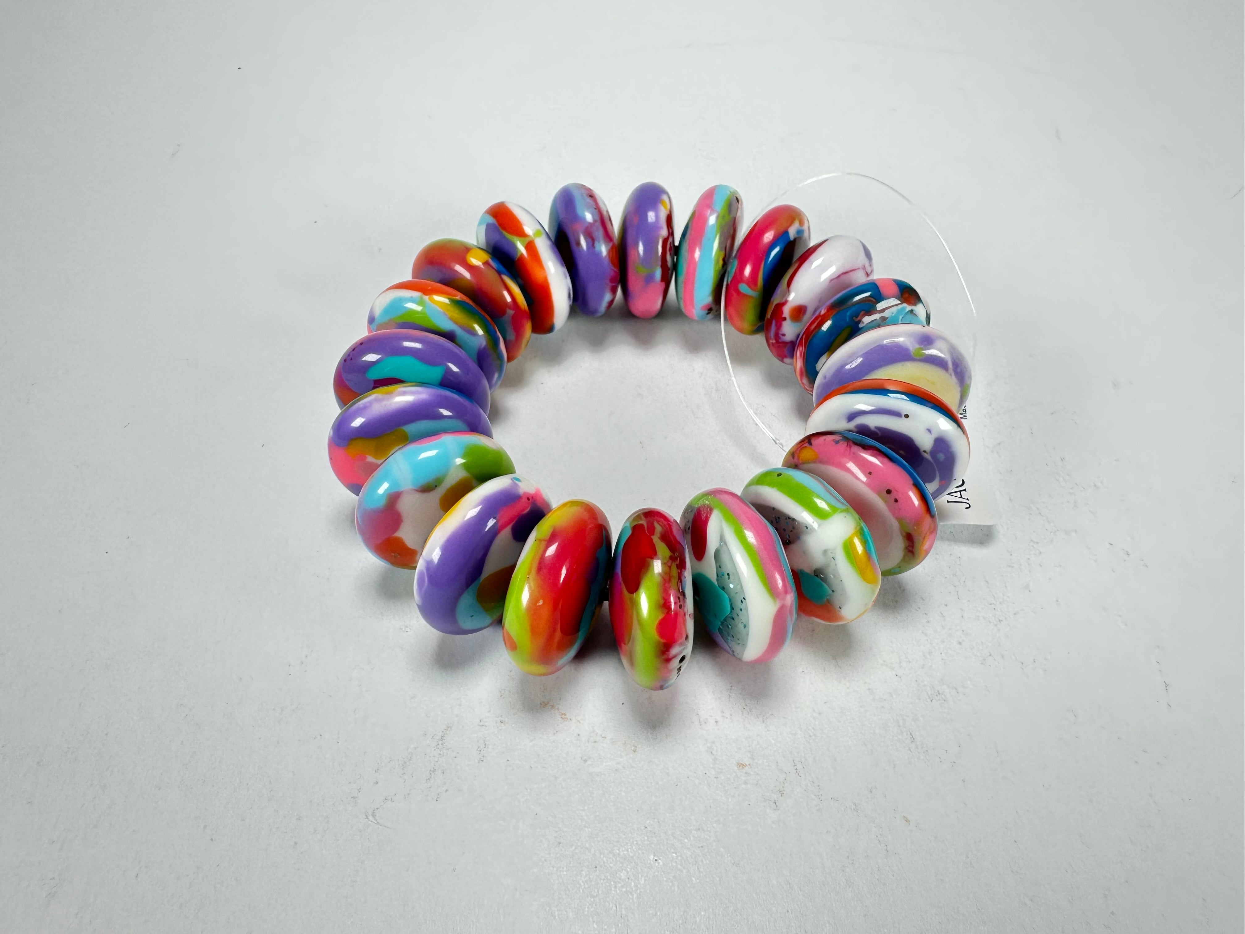 Jackie Brazil "Ana" Kandinsky Elasticated Wheels Resin Bracelet ( B0910 )