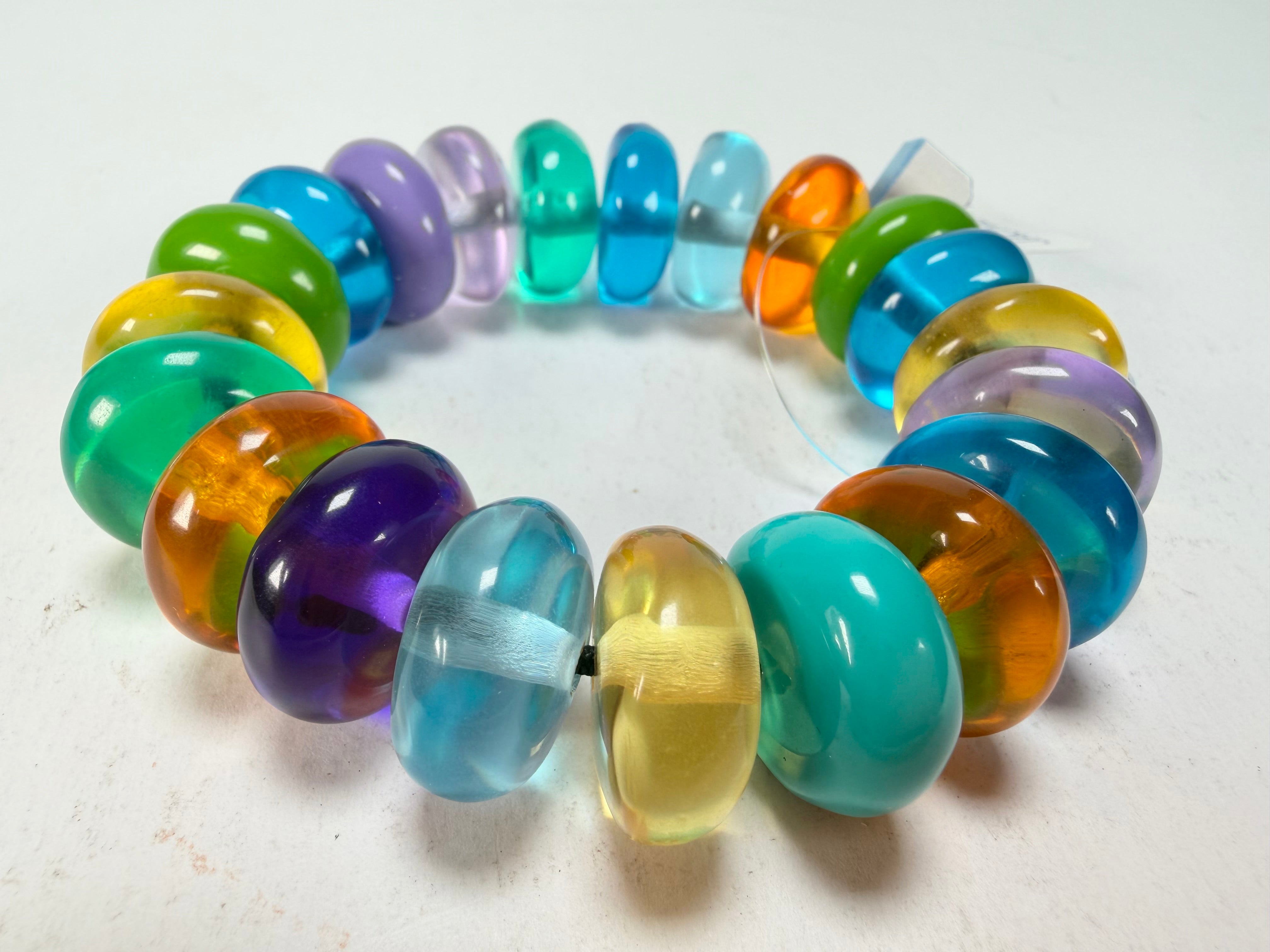 Jackie Brazil "Bela" Transparent Paris Mix Elasticated Mini Wheels Resin Bracelet ( B0920 )