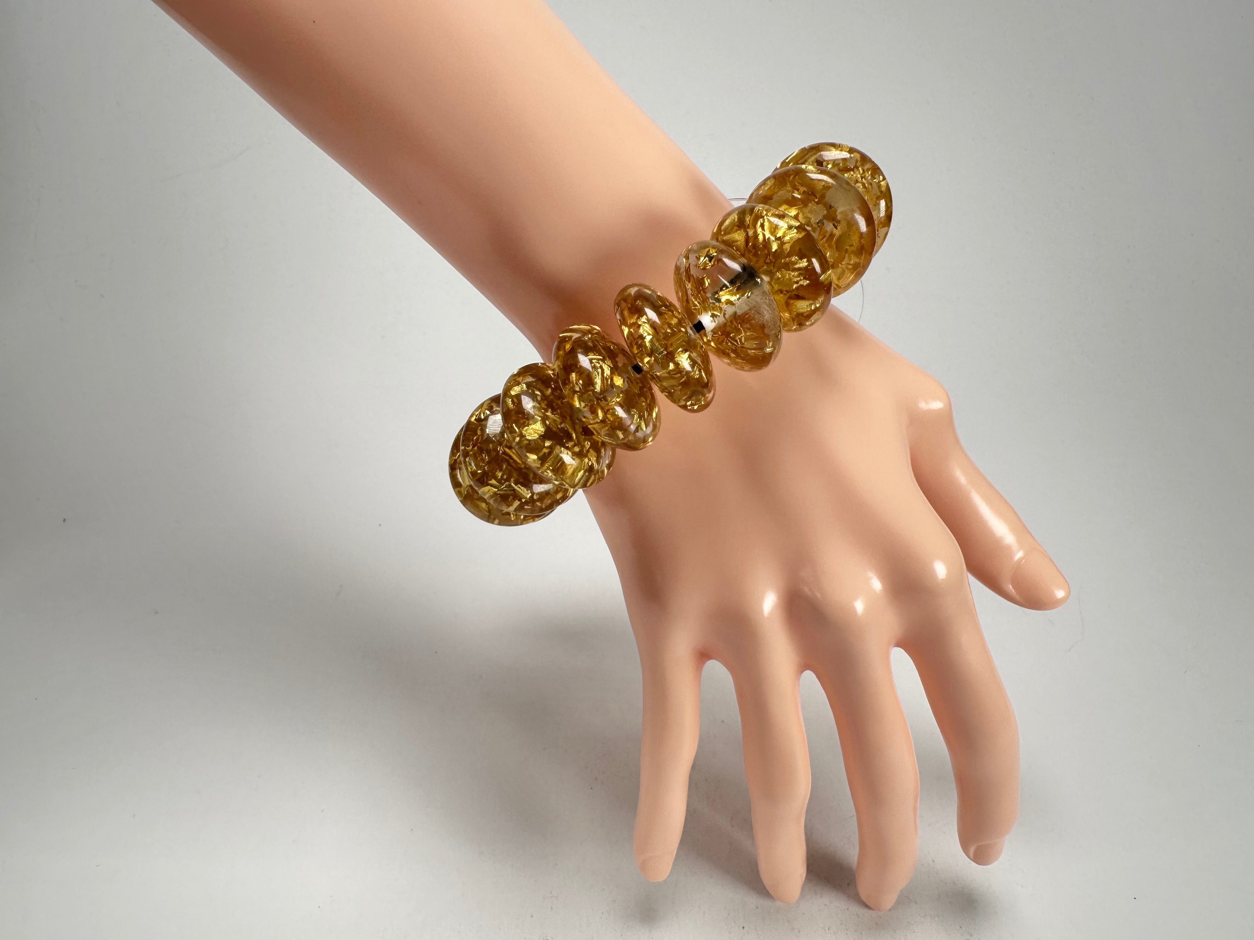 Jackie Brazil "Ana" Gold Flakes Elasticated Wheels Resin Bracelet ( B0910 )