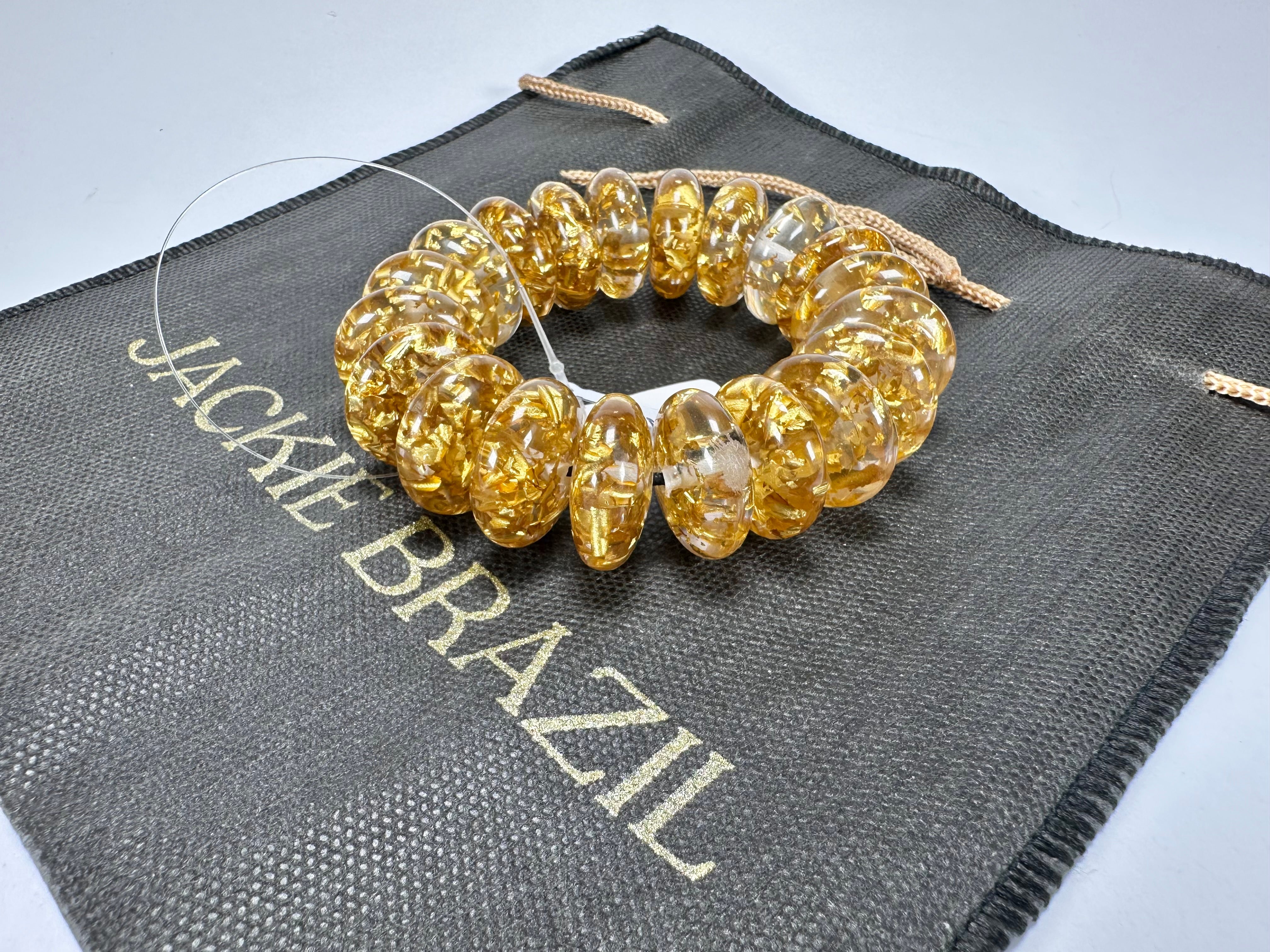 Jackie Brazil "Ana" Gold Flakes Elasticated Wheels Resin Bracelet ( B0910 )