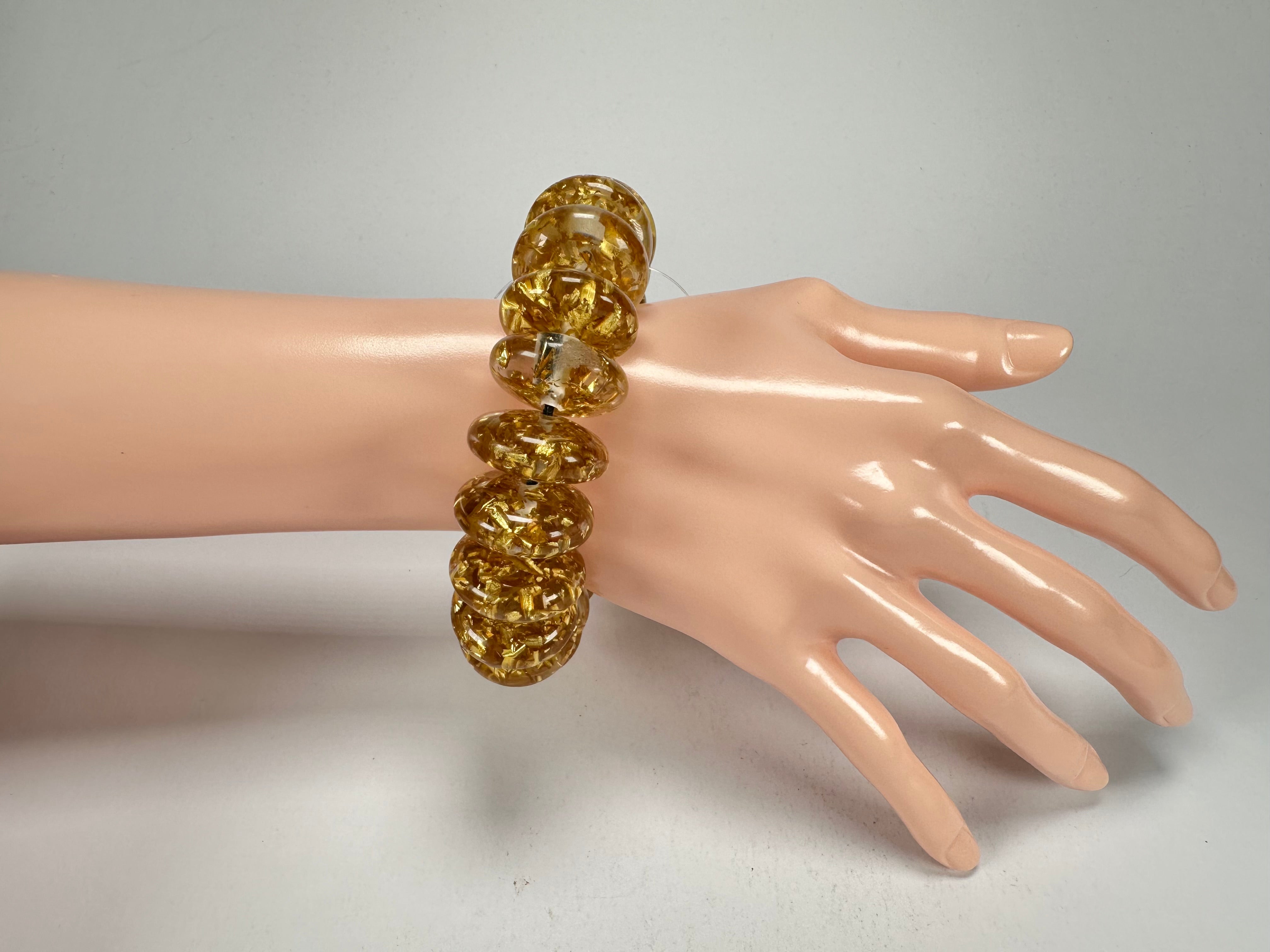 Jackie Brazil "Ana" Gold Flakes Elasticated Wheels Resin Bracelet ( B0910 )