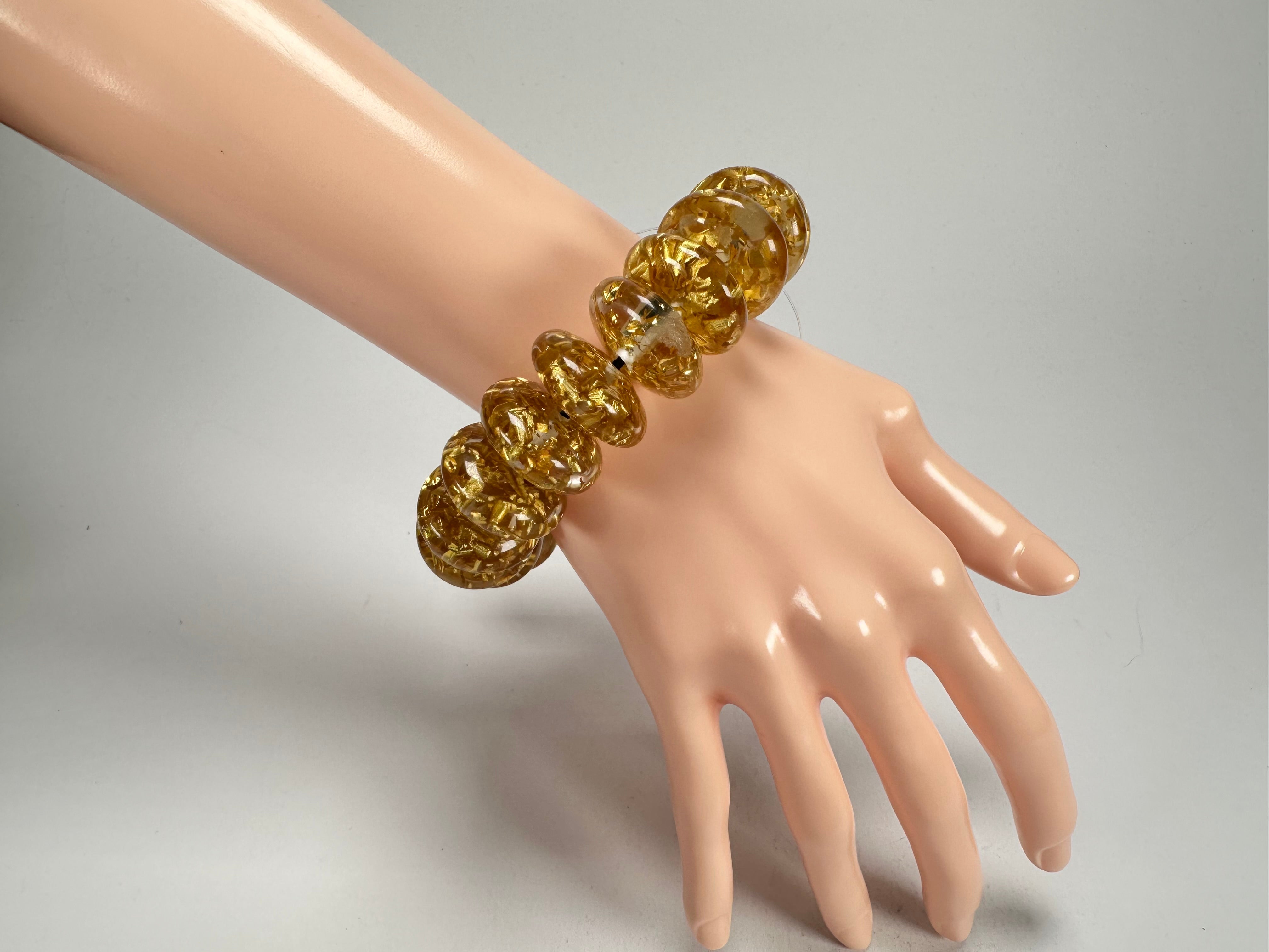 Jackie Brazil "Ana" Gold Flakes Elasticated Wheels Resin Bracelet ( B0910 )