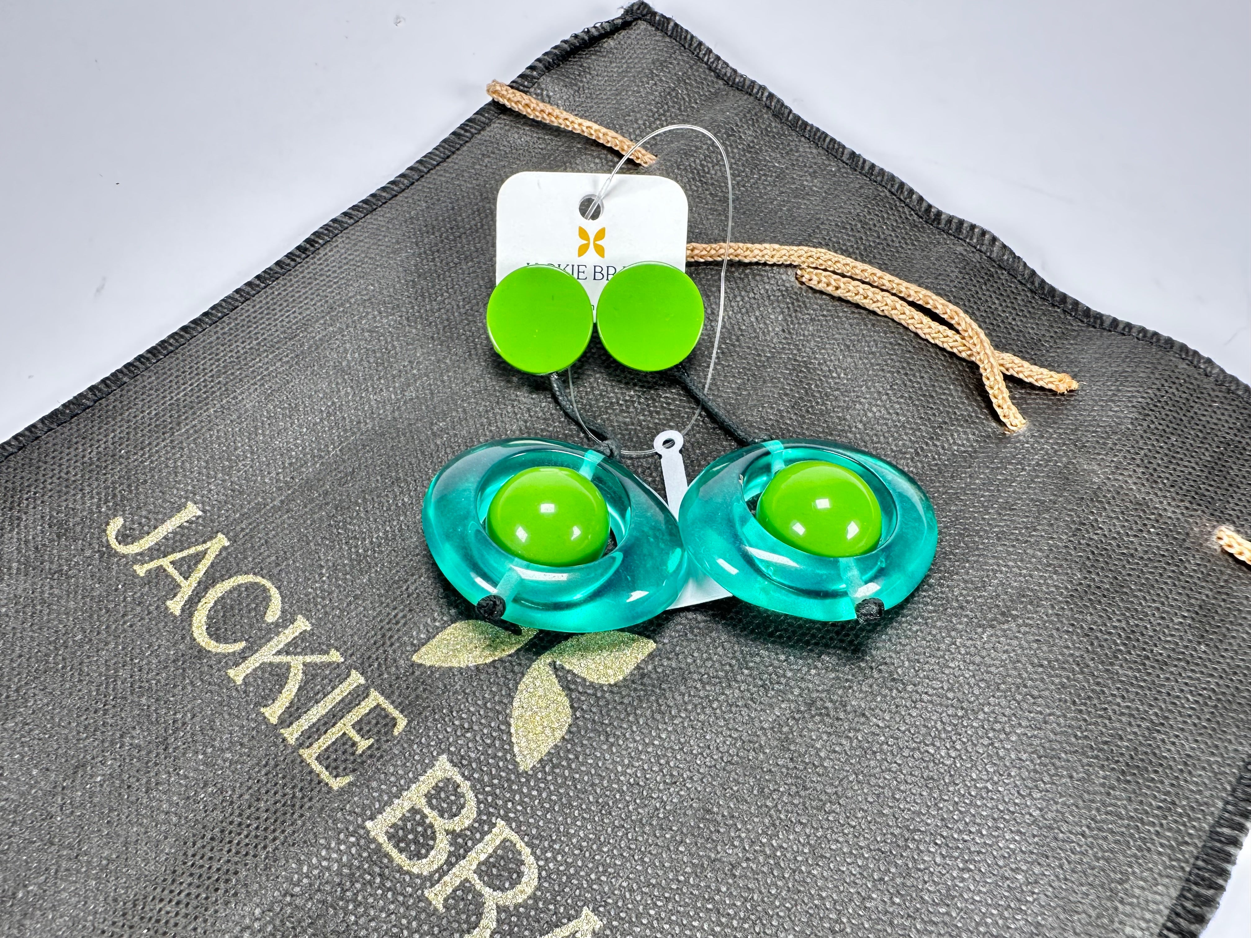 Jackie Brazil "Saturn" Transparent Green Disk & Ball on Cord Resin Earrings ( E0052 )