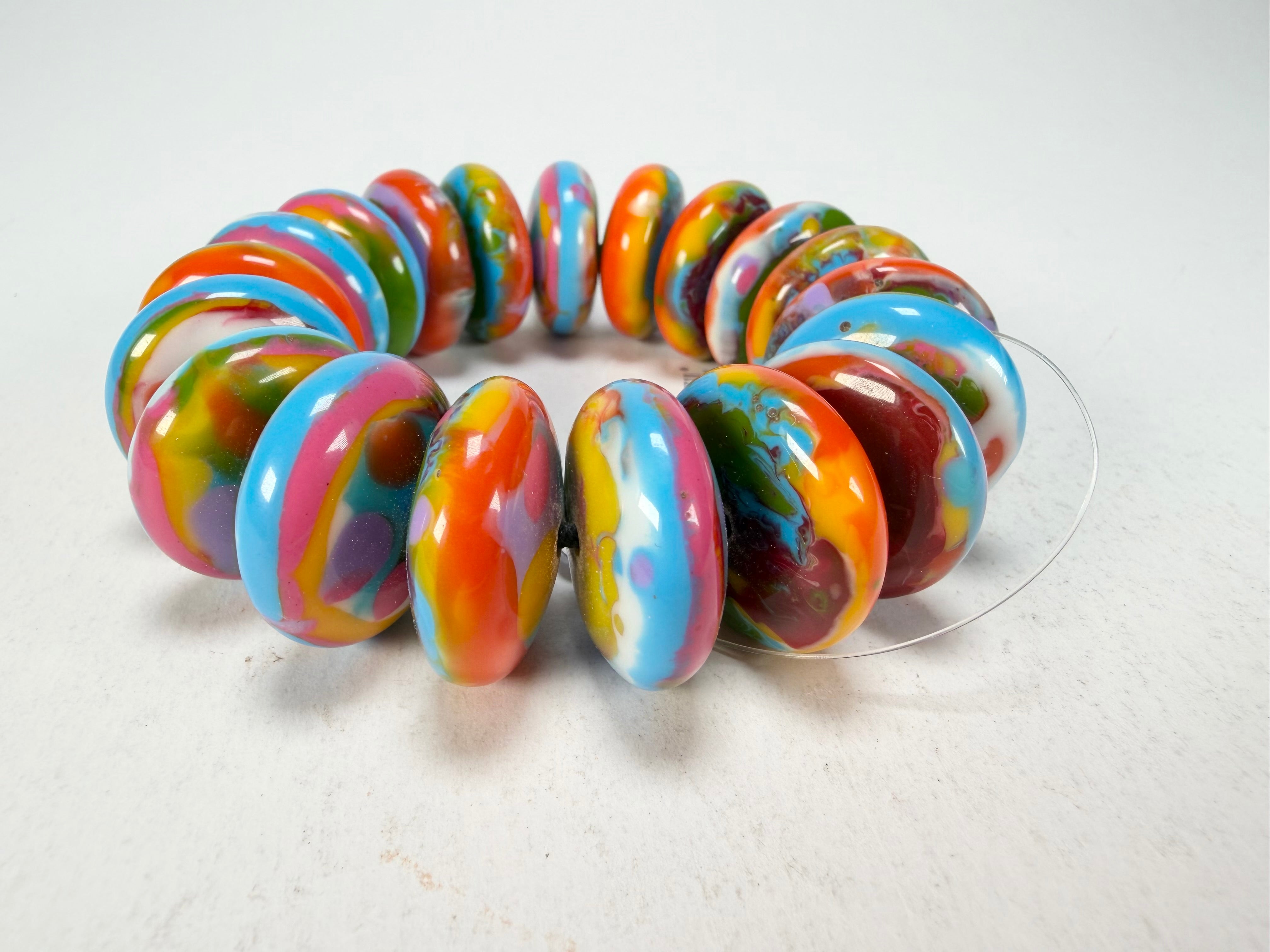 Jackie Brazil "Ana" Kandinsky Elasticated Wheels Resin Bracelet ( B0910 )