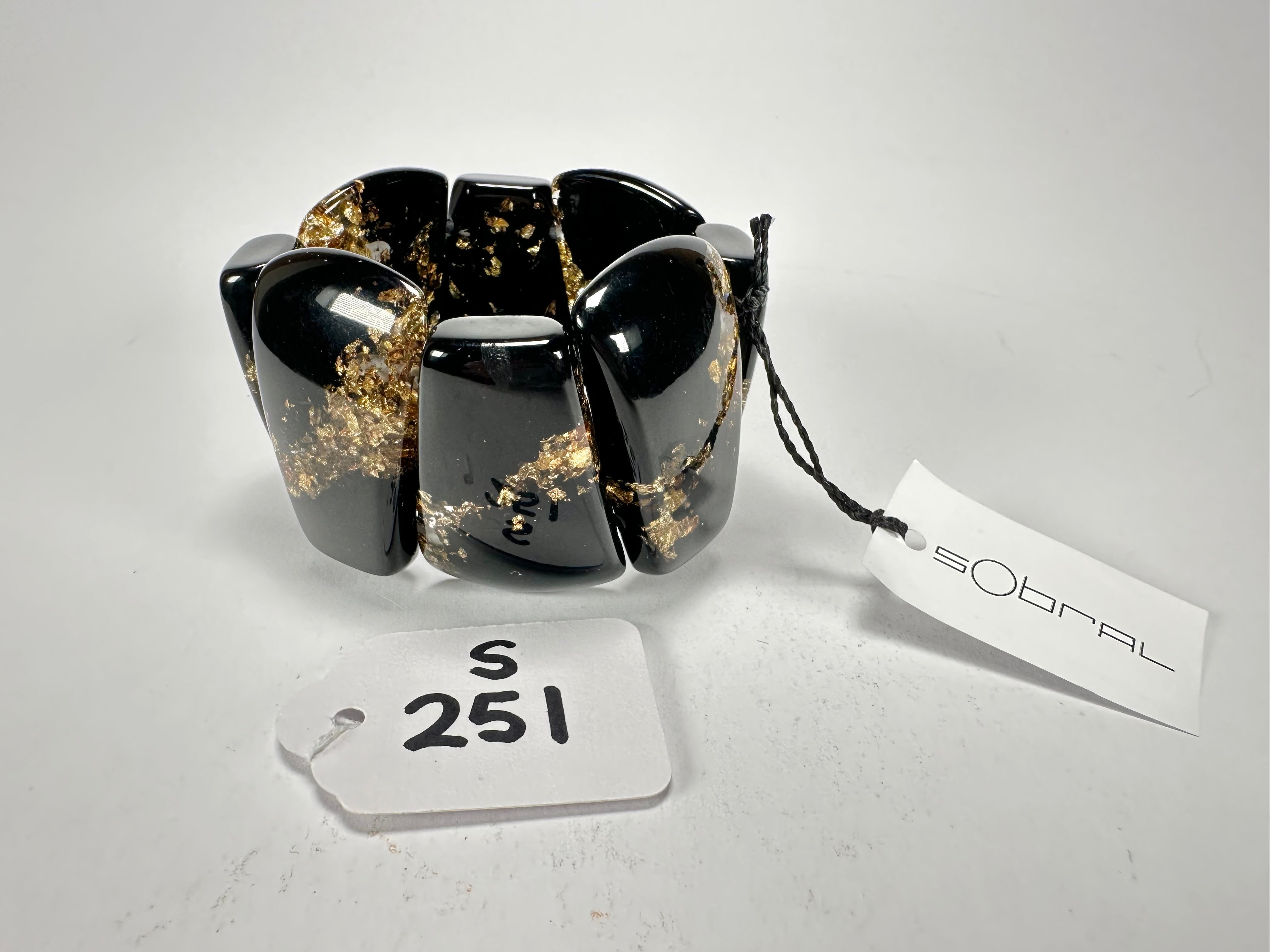 Sobral - Metalique "Rimla" Black & Gold Elasticated Resin Bracelet ( 004498 )